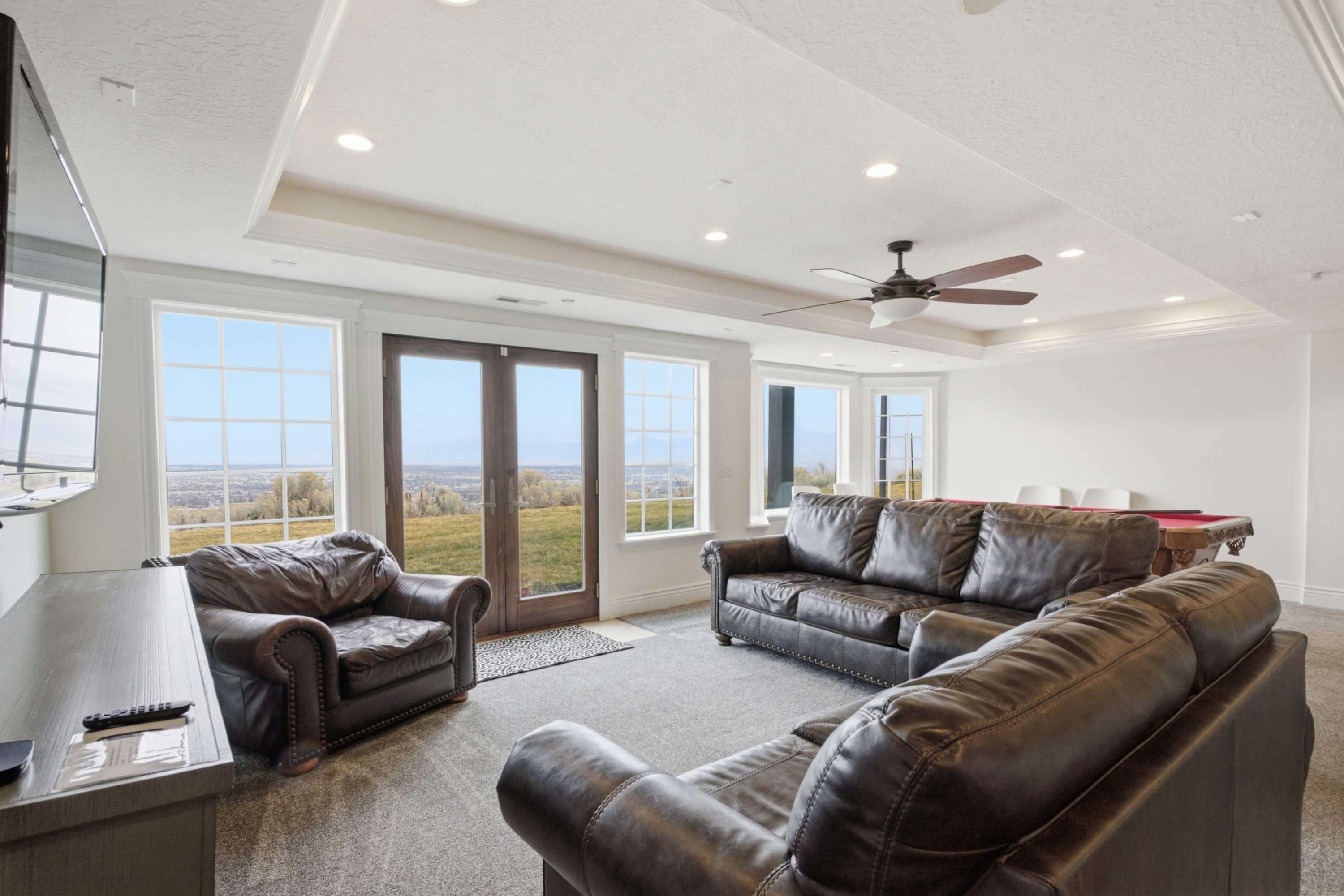 Bright lounge area with direct access to panoramic views