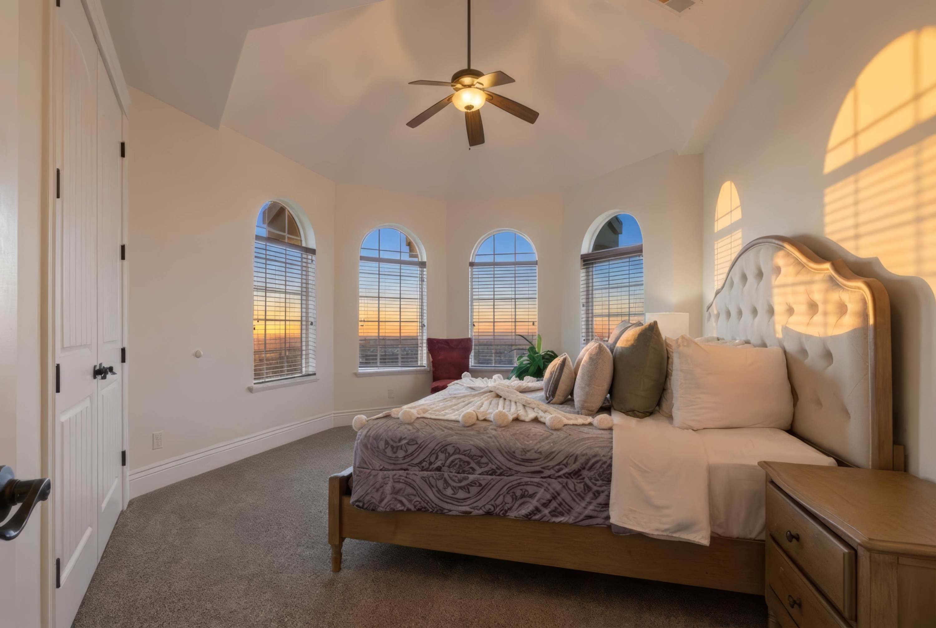 Peaceful guest room filled with natural light and scenic views