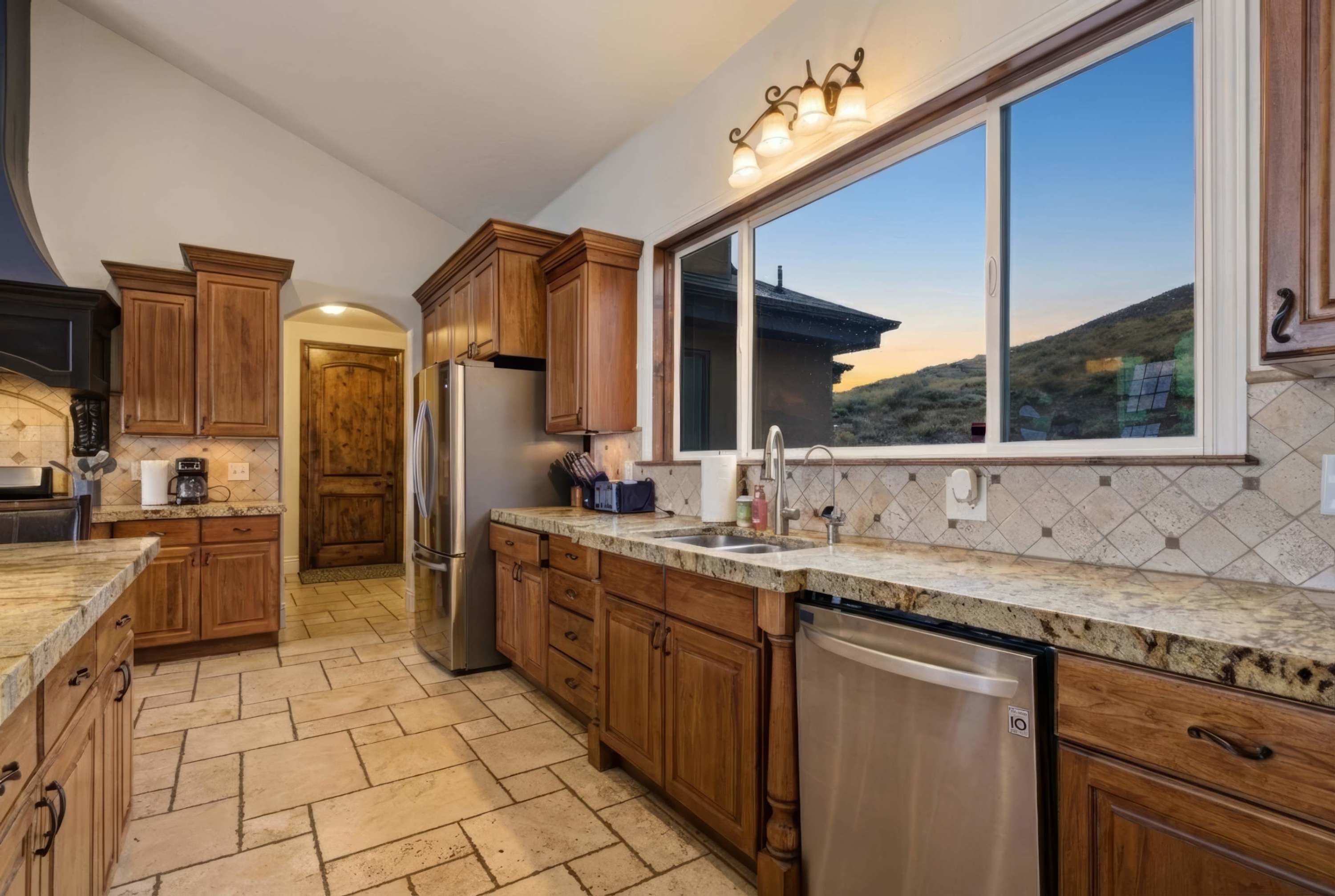 Stainless steel appliances and generous counter space for large-group meals