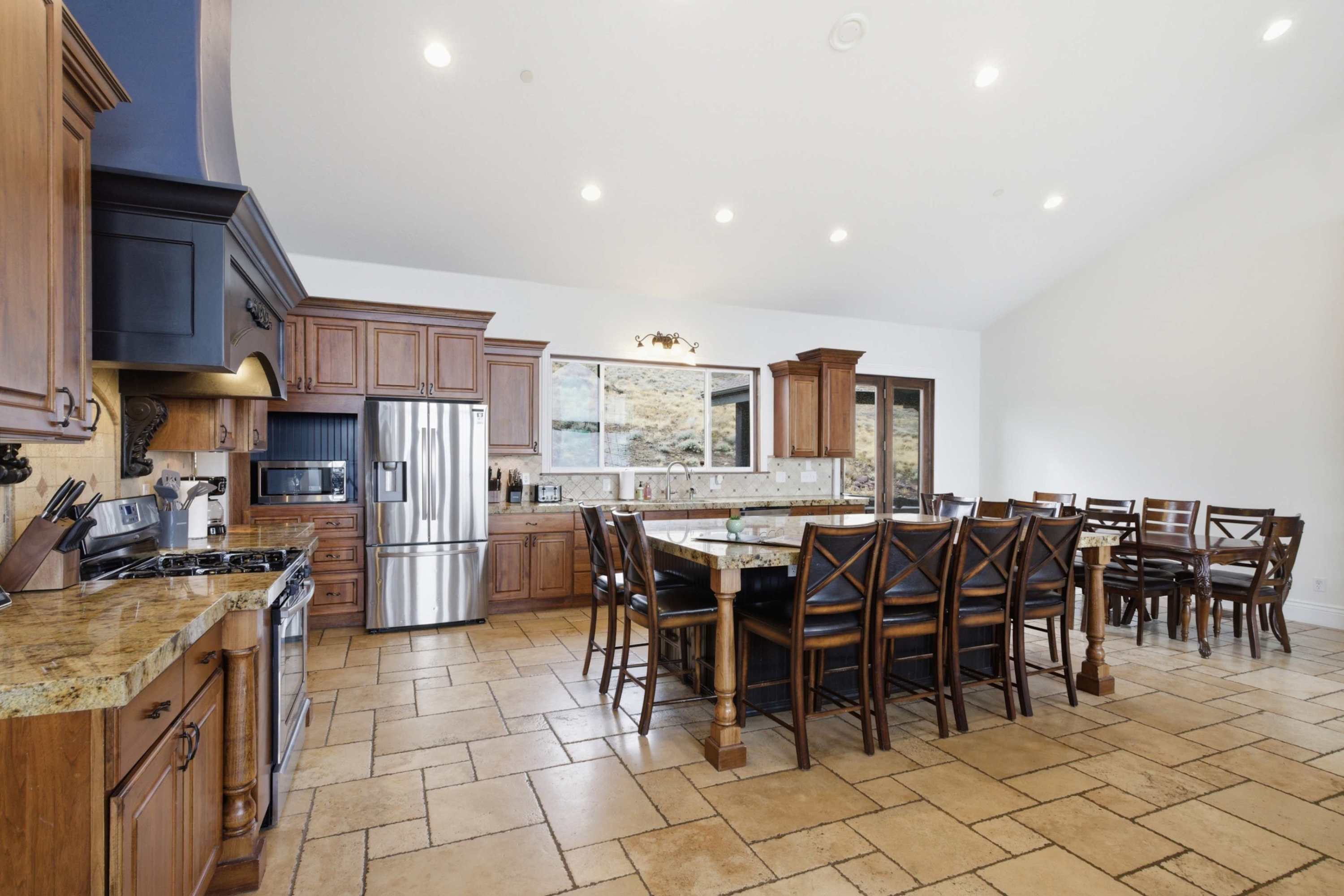 Large chef's kitchen with island and seating for the whole group