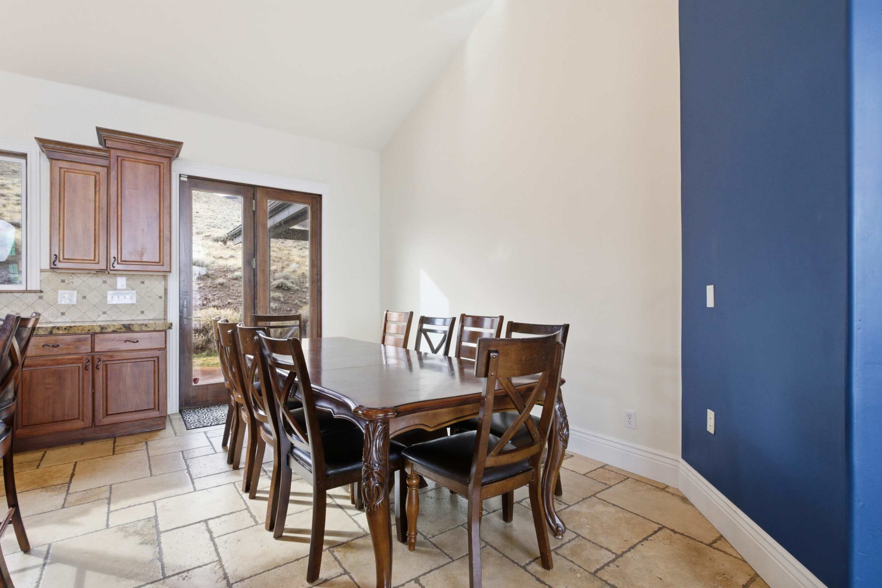 Dining table can seat 10, seating for an additional 10 people at the island