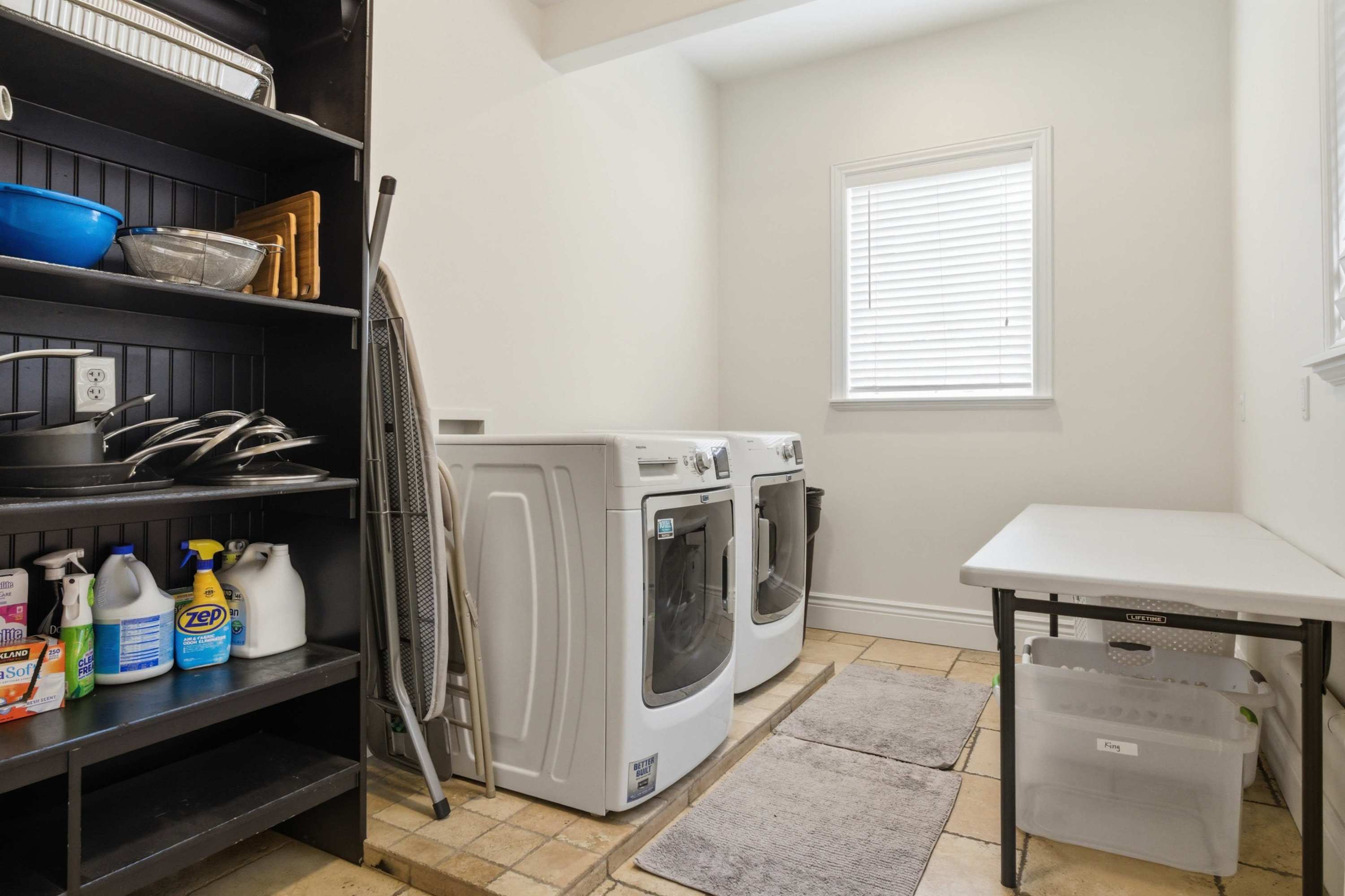 Organized laundry and utility space for extended stays