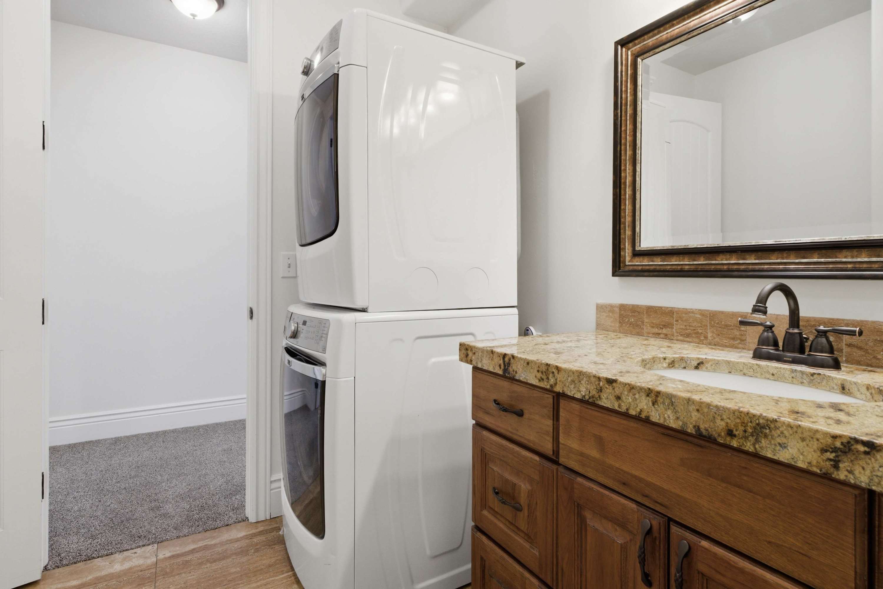 Laundry area with washer and dryer for guest convenience