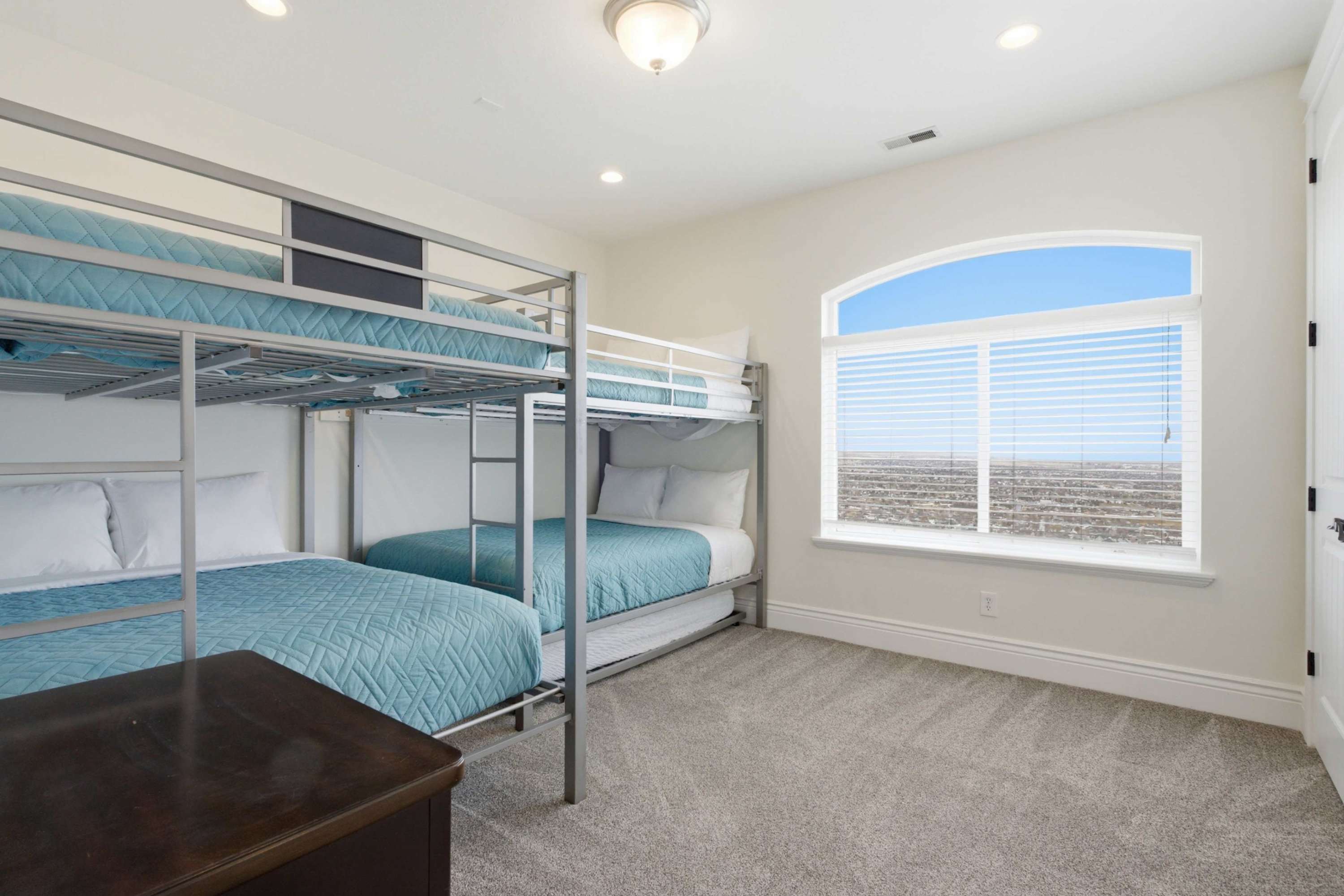 Large bunk room designed to comfortably sleep multiple guests