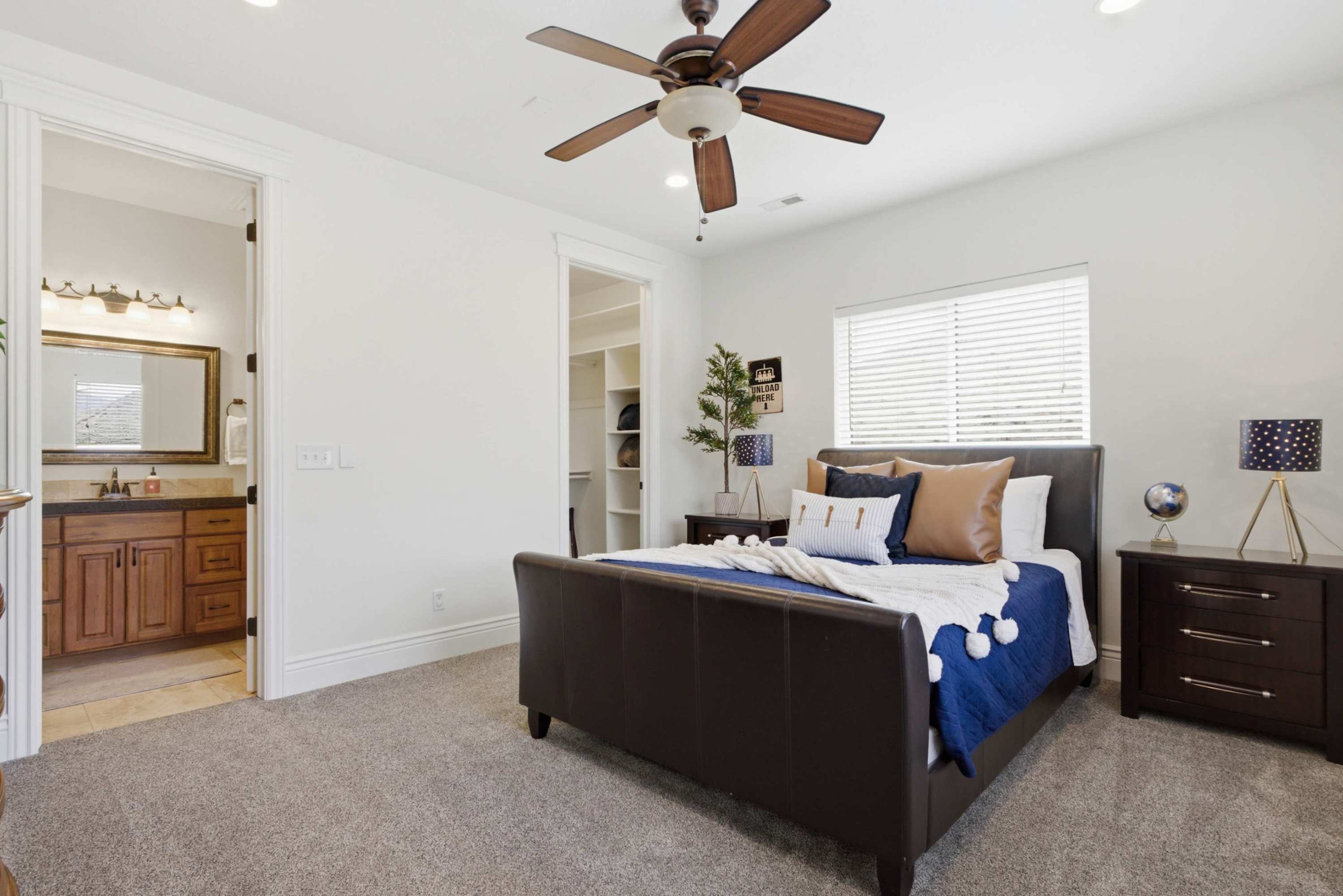 Another beautifully appointed bedroom with soft neutral tones