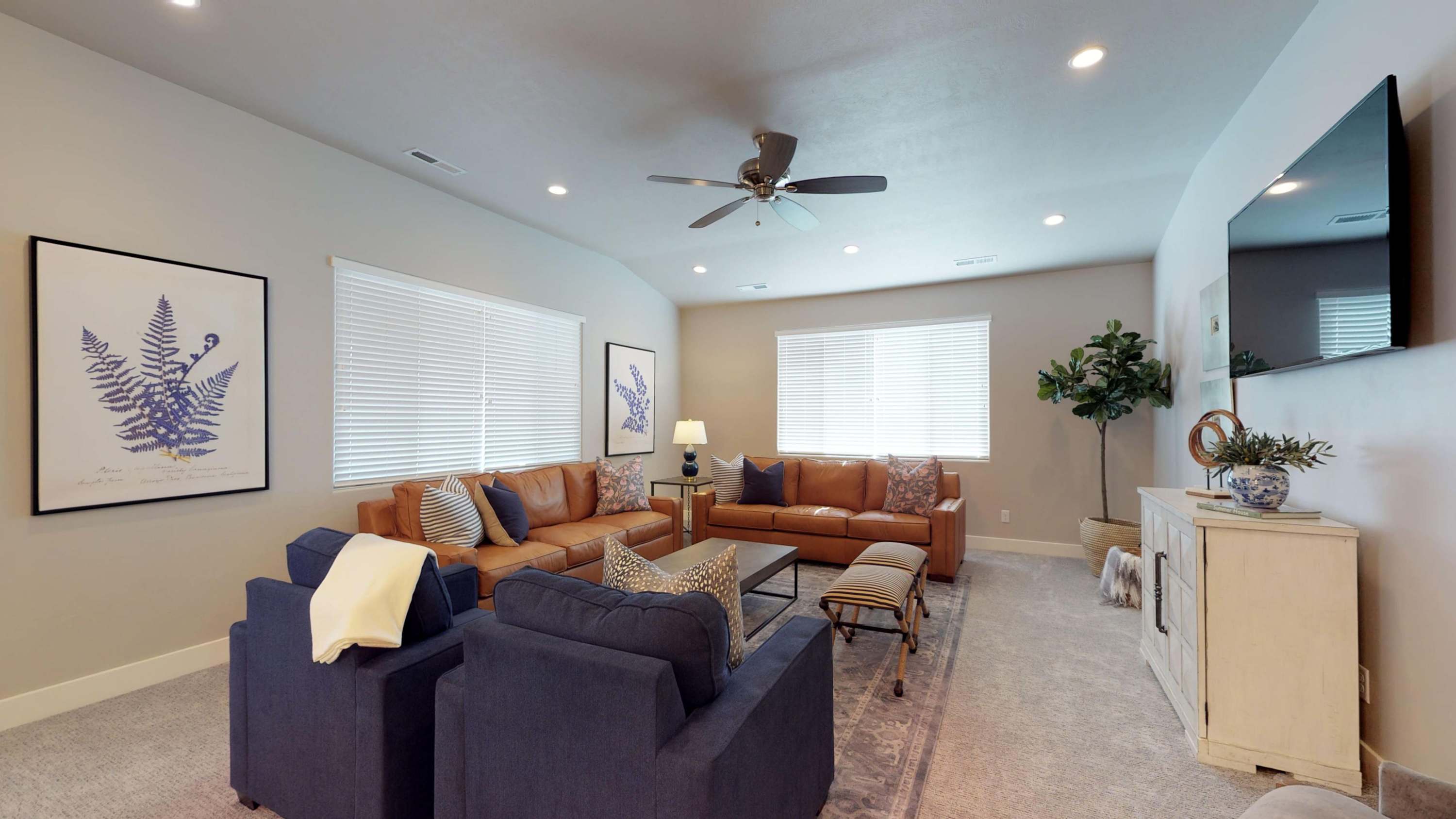 109 - Family Room with comfortable sofas and chairs with TV