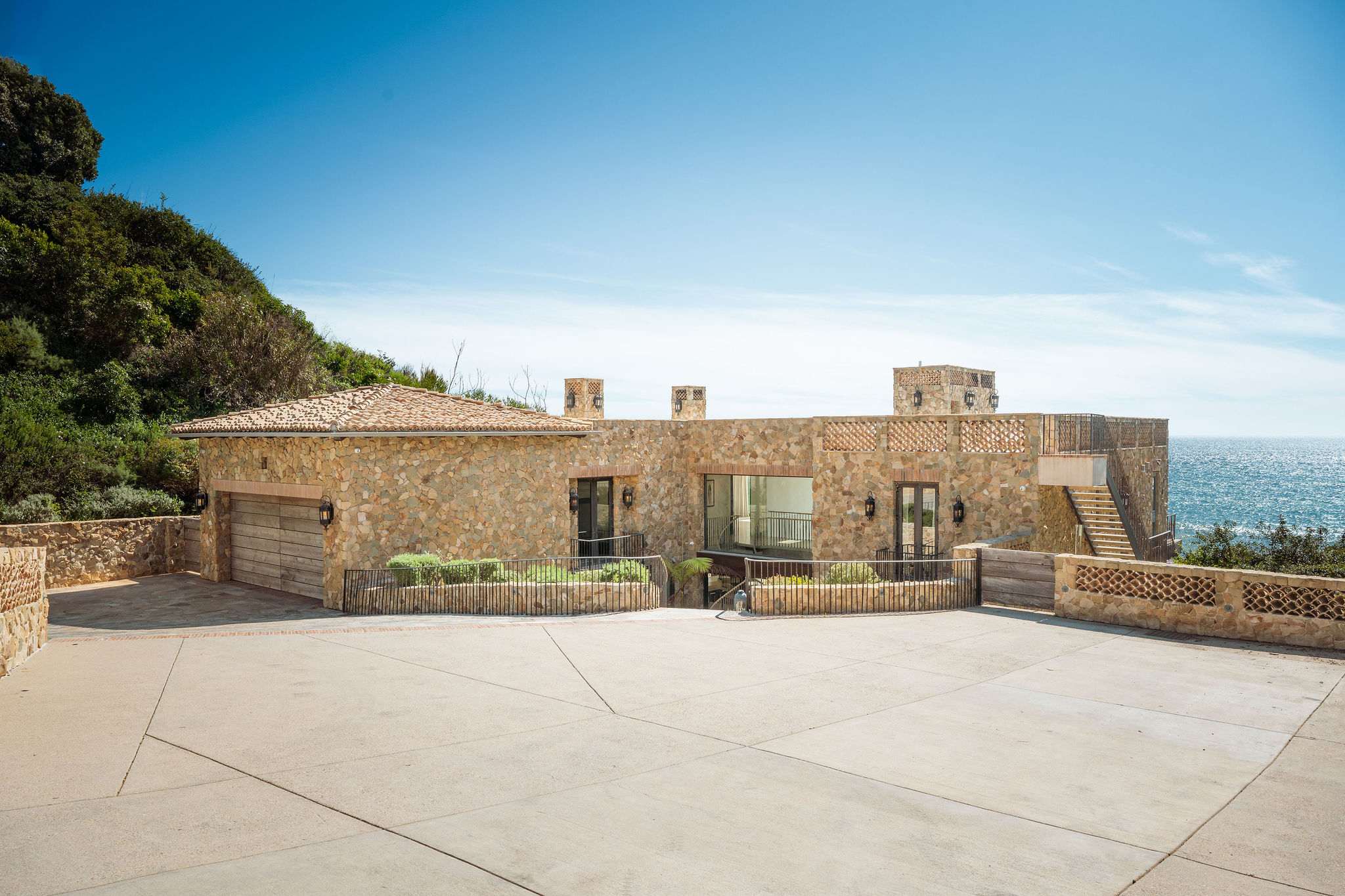 Casa di Pietra from above — one of Malibu’s most scenic oceanfront homes.