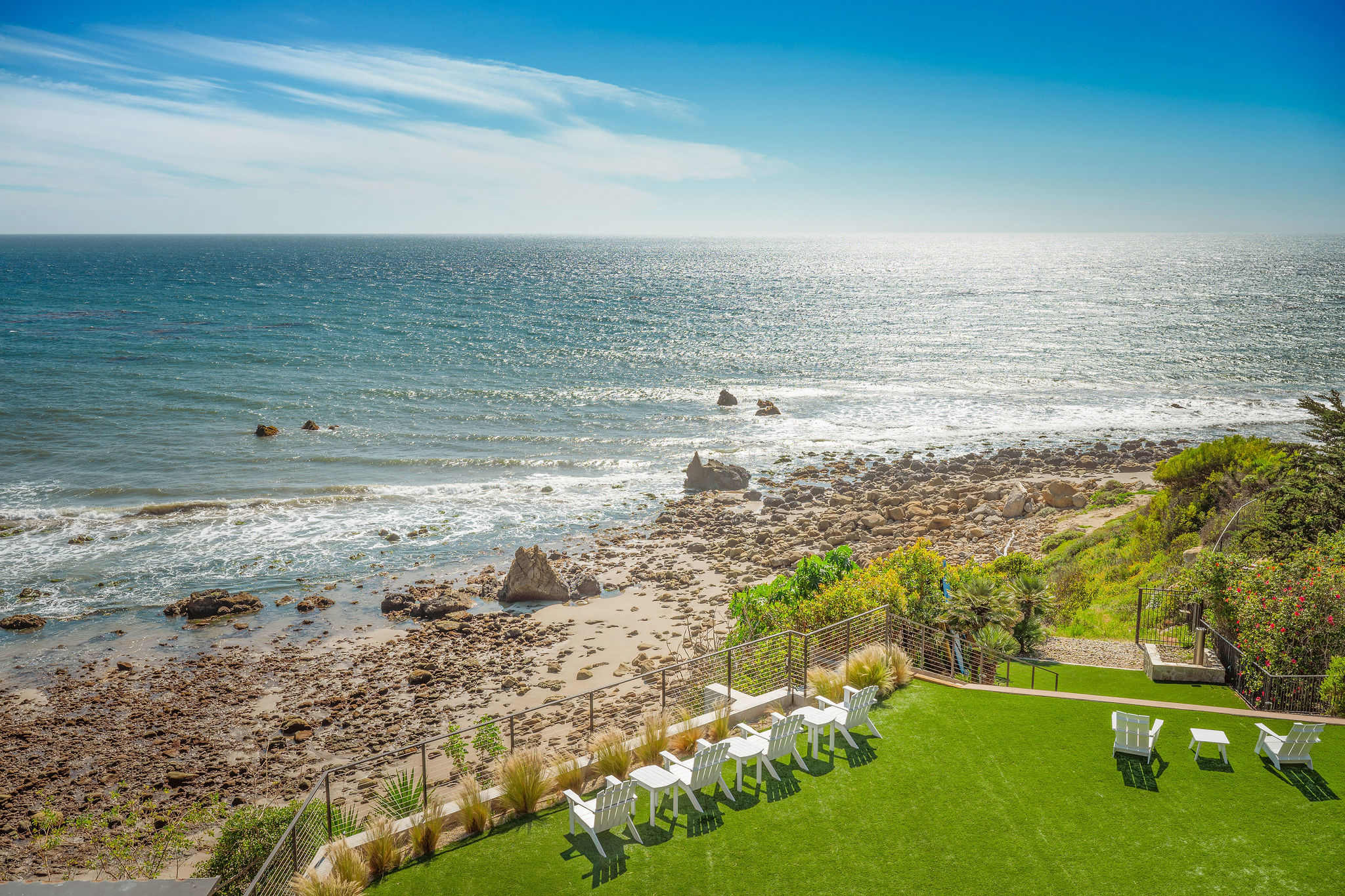 Relax on the Malibu oceanview lawn overlooking the Pacific.