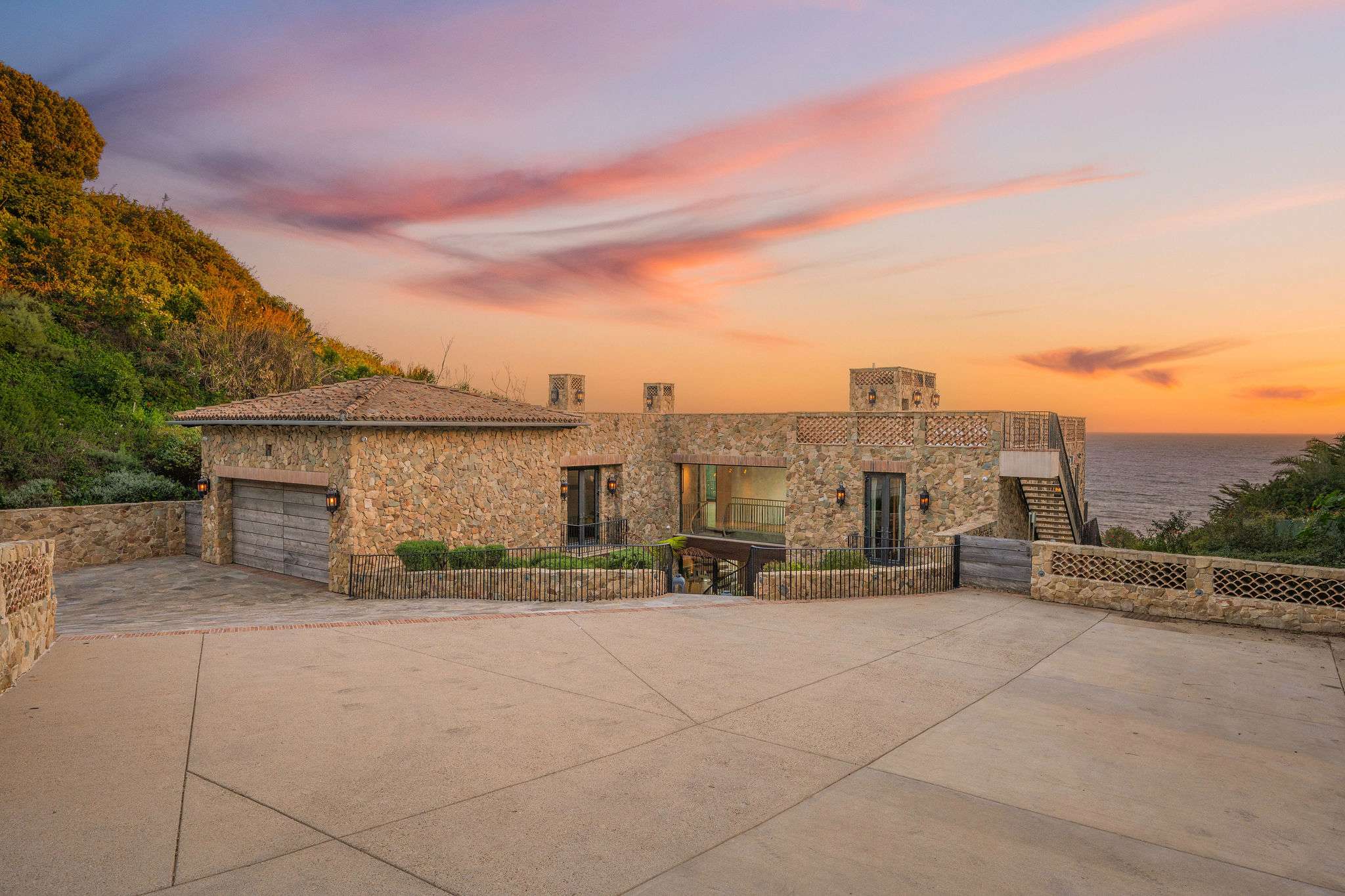 This Malibu luxury villa sits on a private oceanfront bluff.