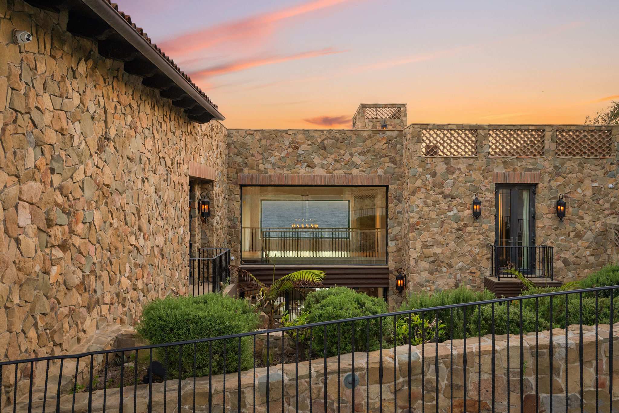 Handcrafted stonework creates a unique Malibu oceanfront villa.
