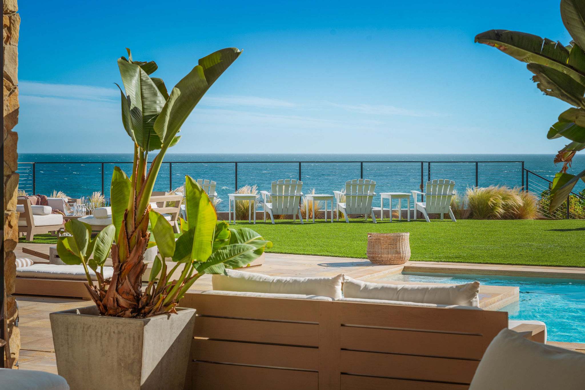 A scenic Malibu oceanfront lawn perfect for sunset watching.