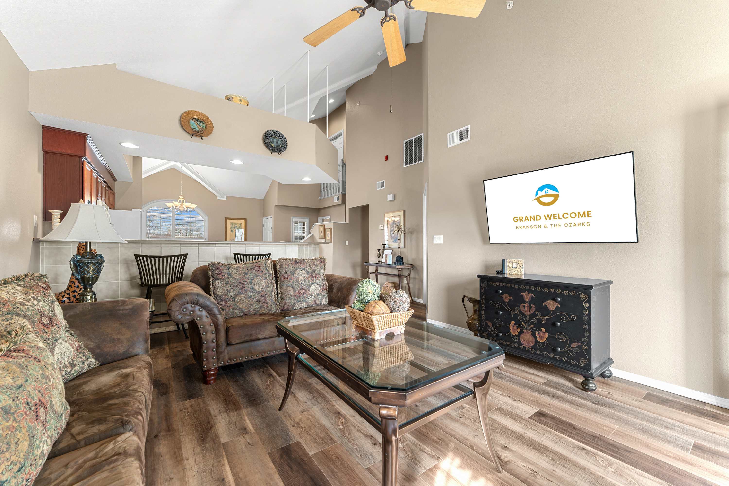 Cozy and spacious living area with TV