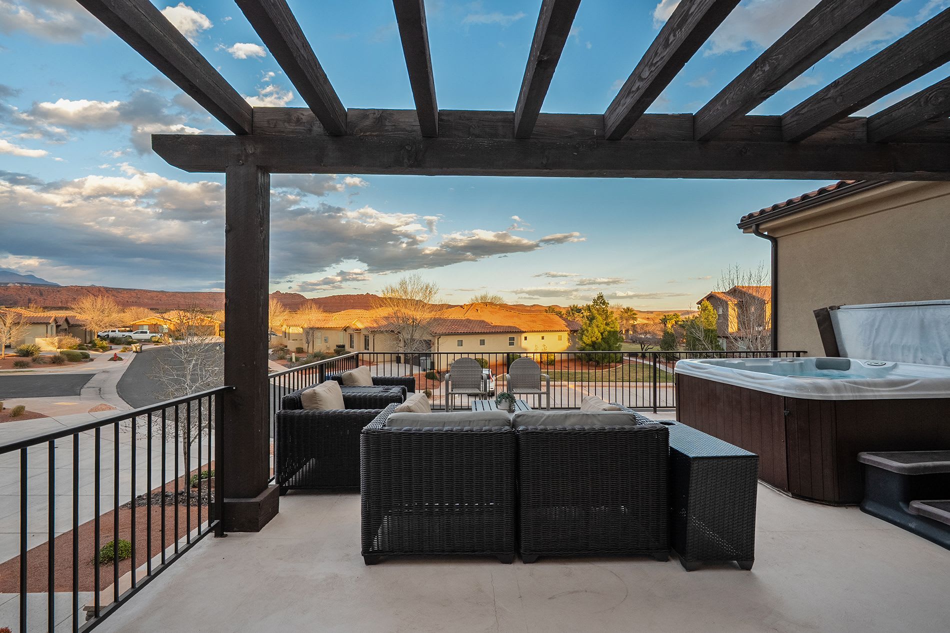 Balcony lounge with outdoor seating, private hot tub and stunning desert views