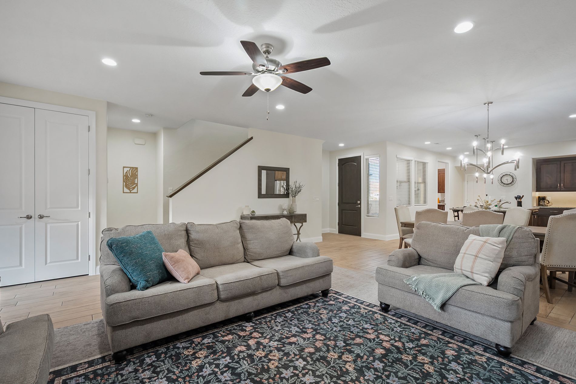 Bright living room connecting to the open kitchen and dining area
