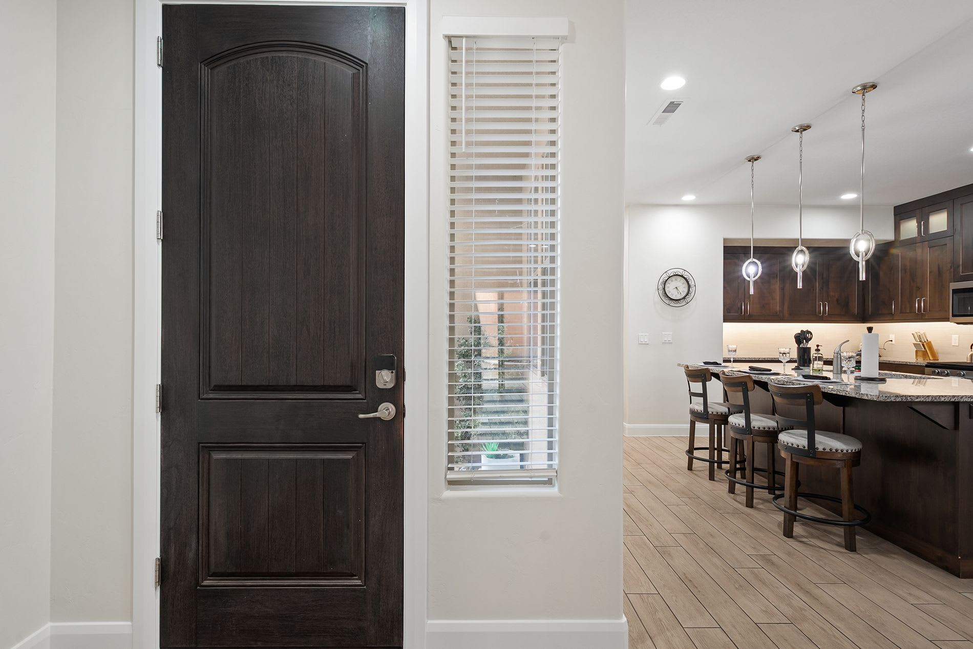 Bright open entryway leading to living spaces