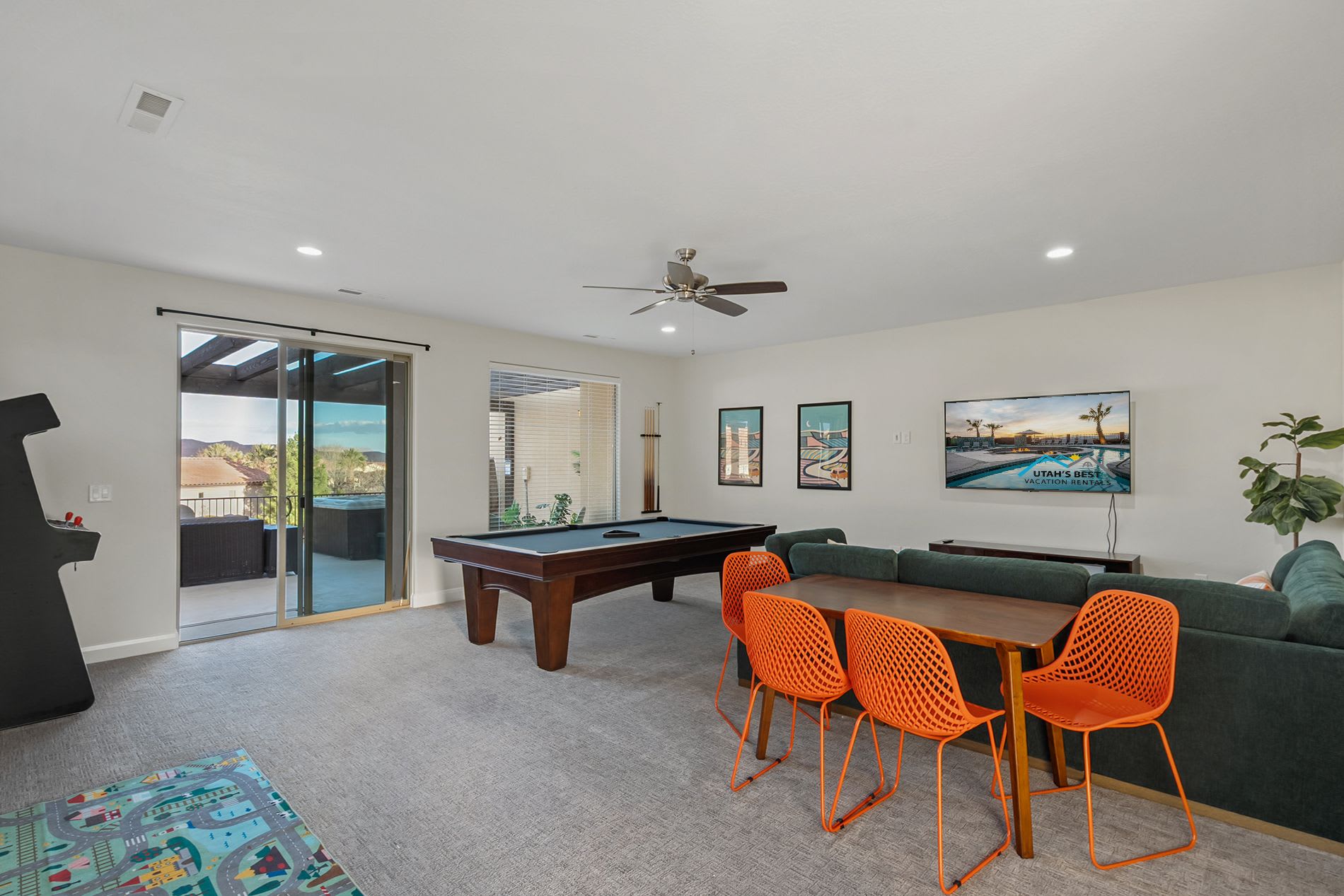 Game room with pool table and lounge seating
