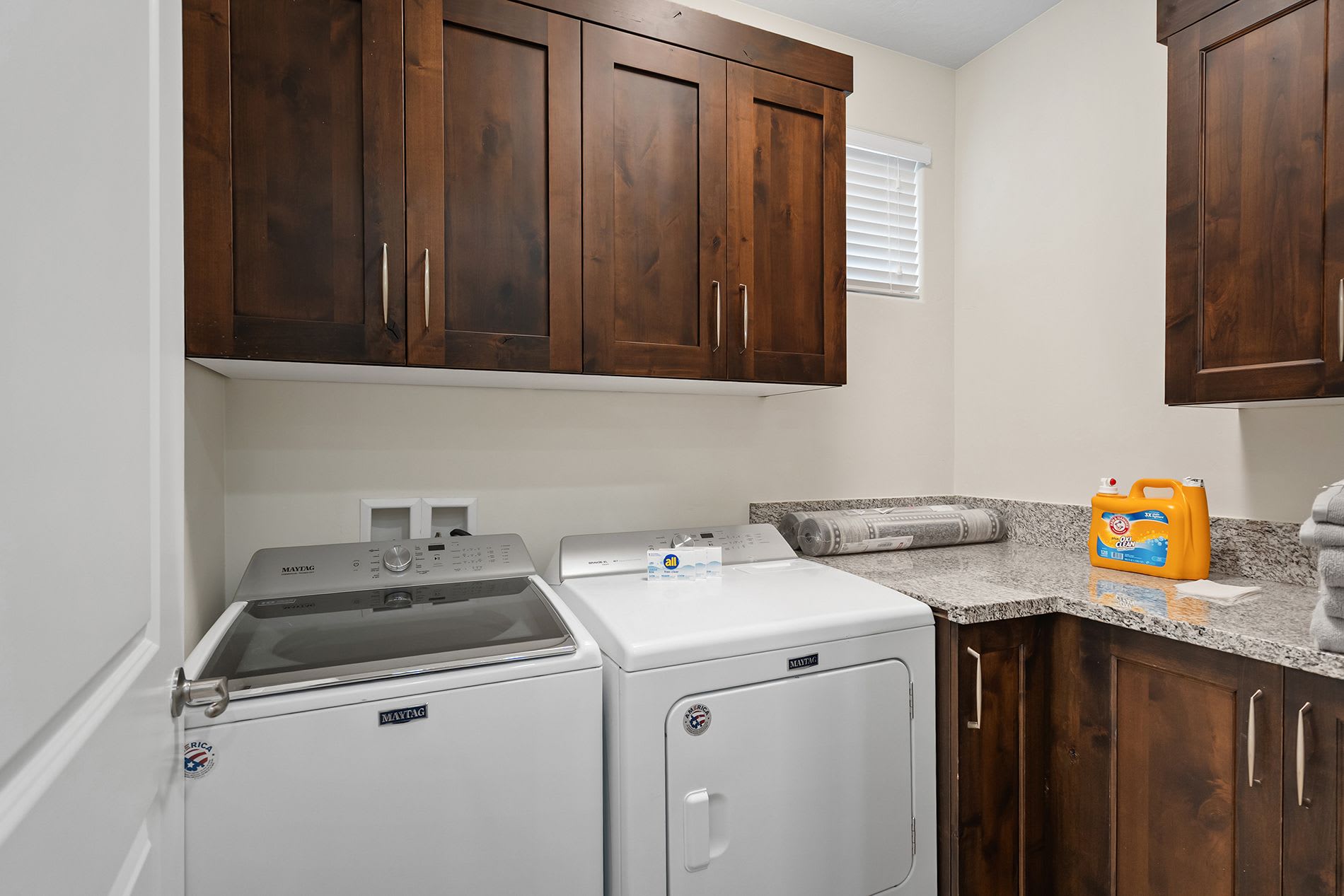 Laundry room with full washer and dryer