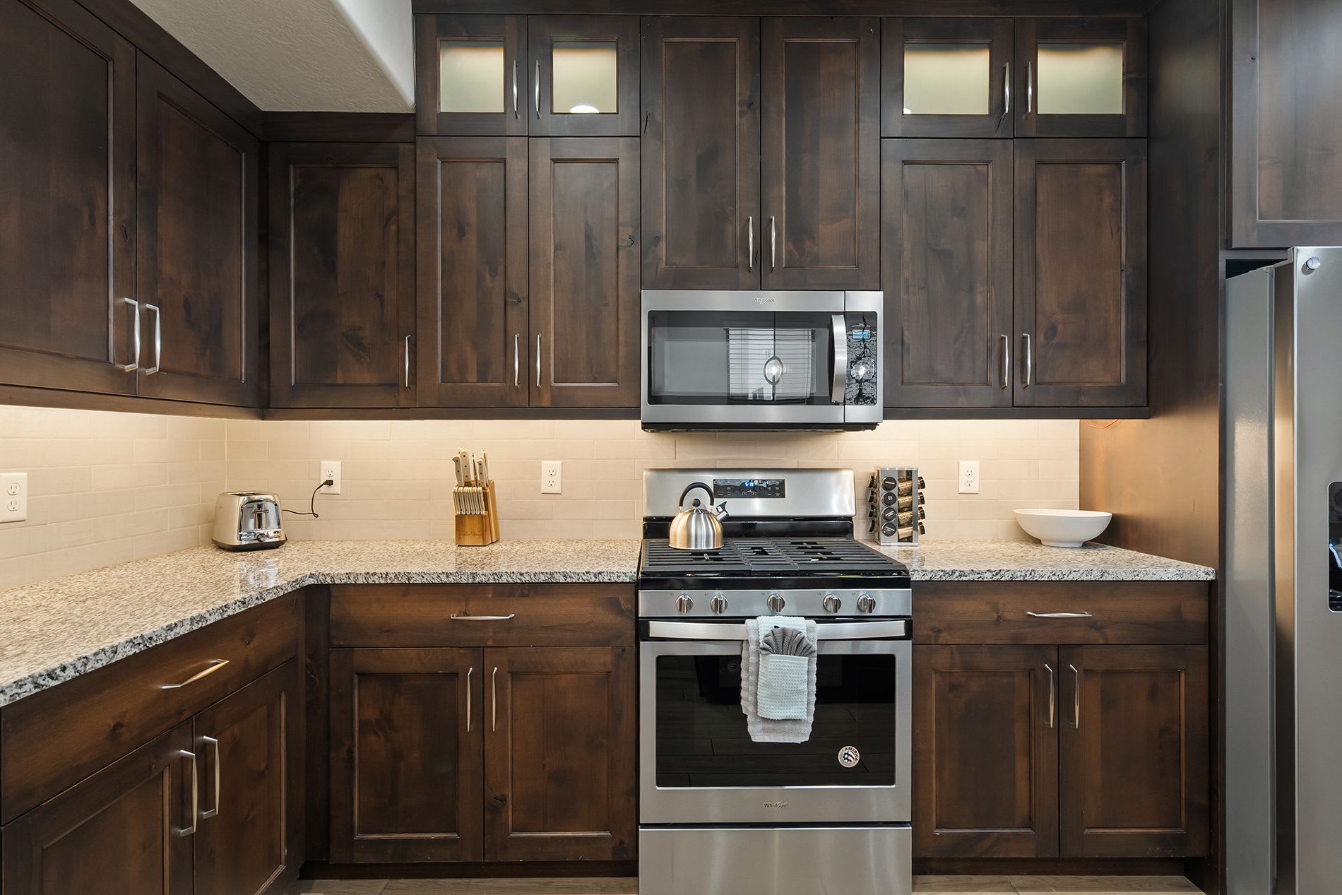 Fully equipped kitchen with granite countertops