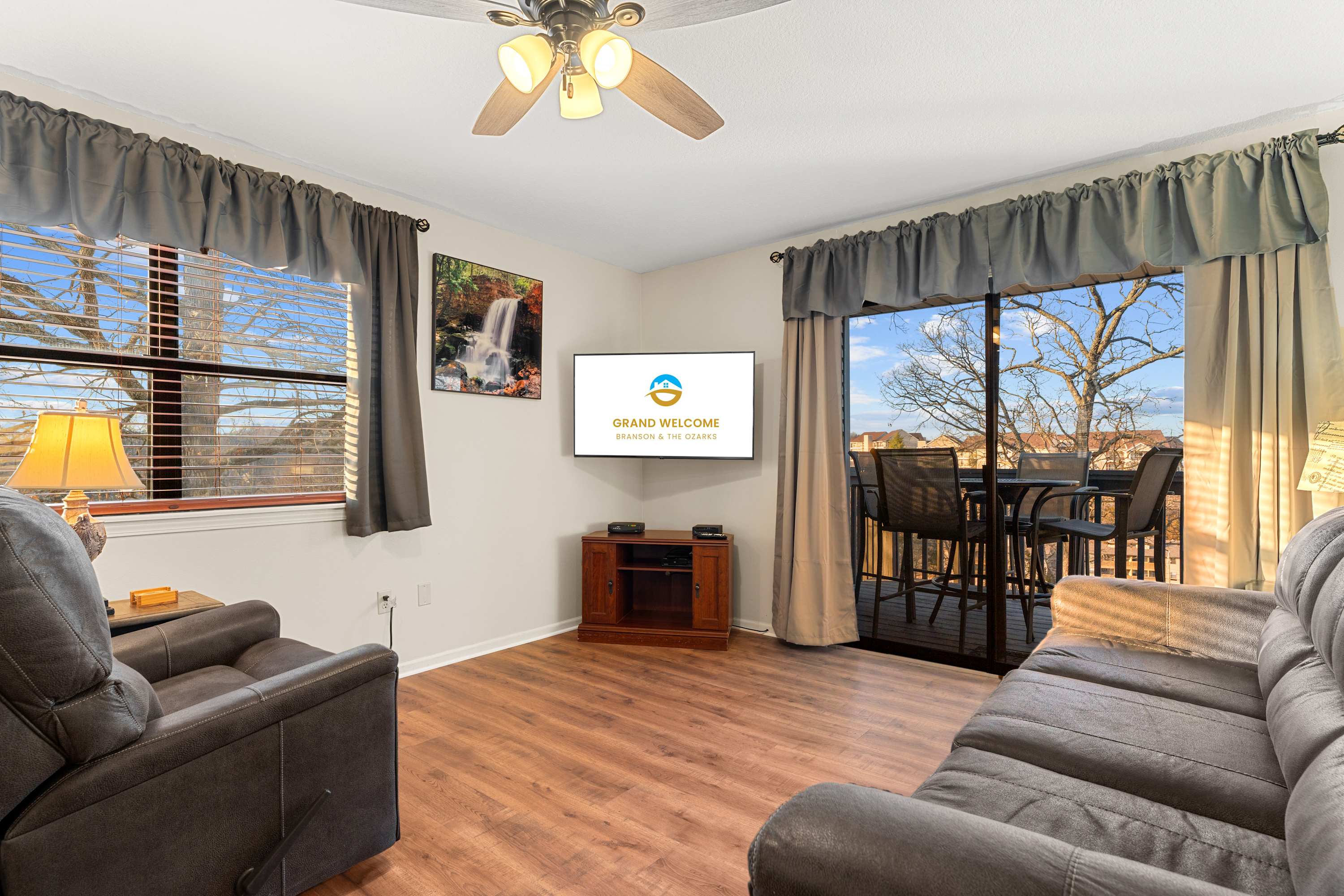 Cozy and spacious living area with TV