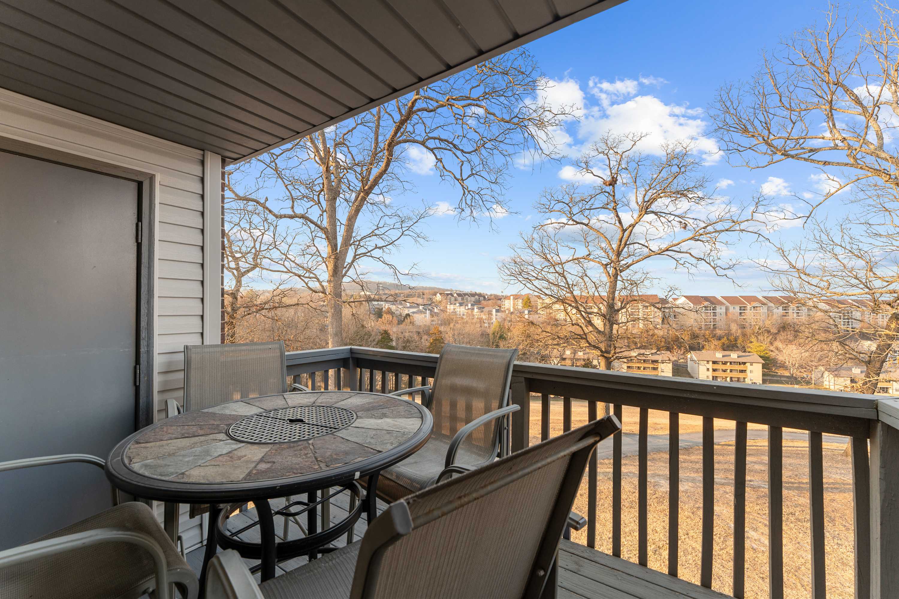 Balcony with outdoor dining and seating for 4
