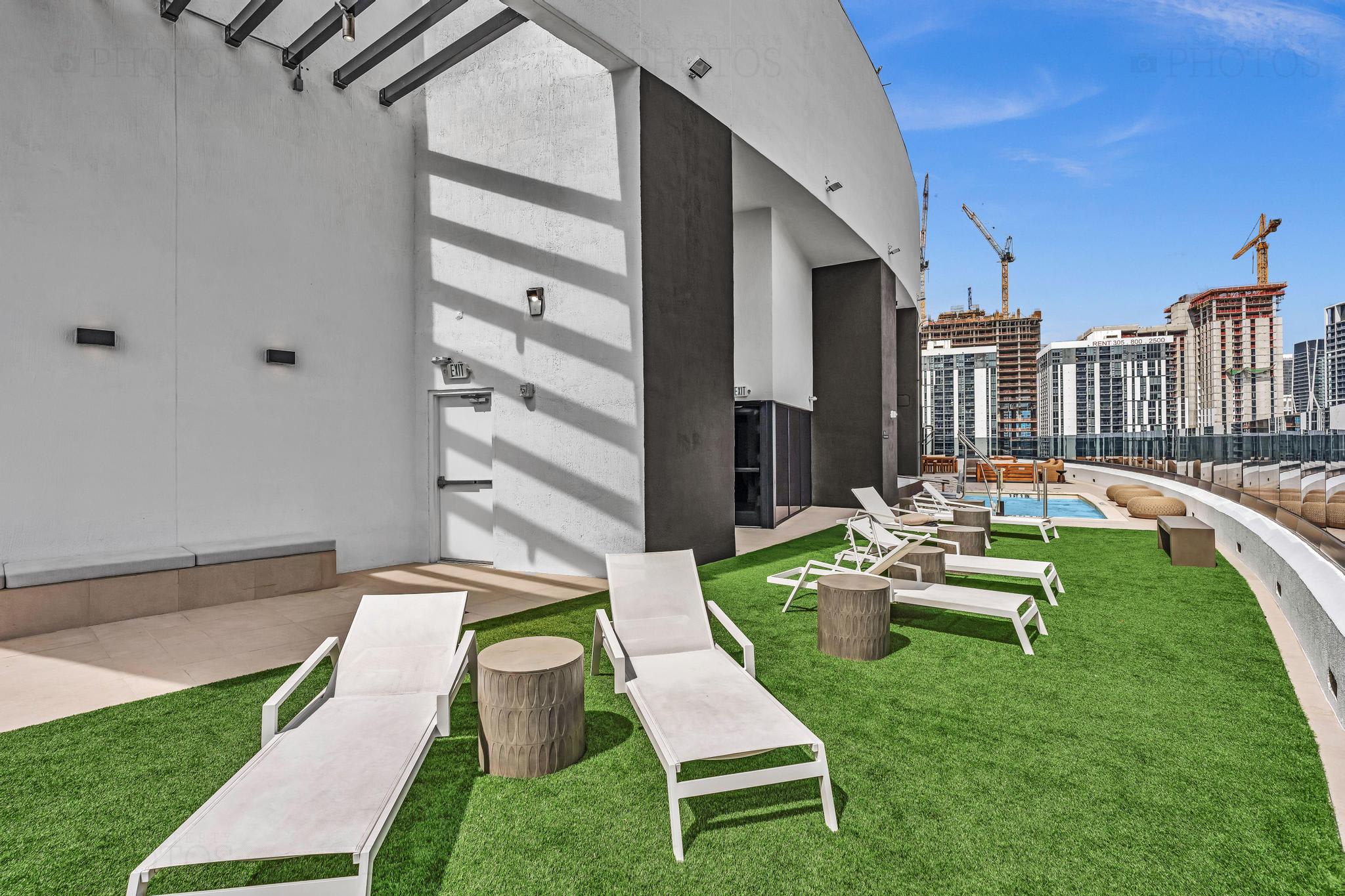 Relax on the rooftop lounge with stunning city views and a refreshing pool.