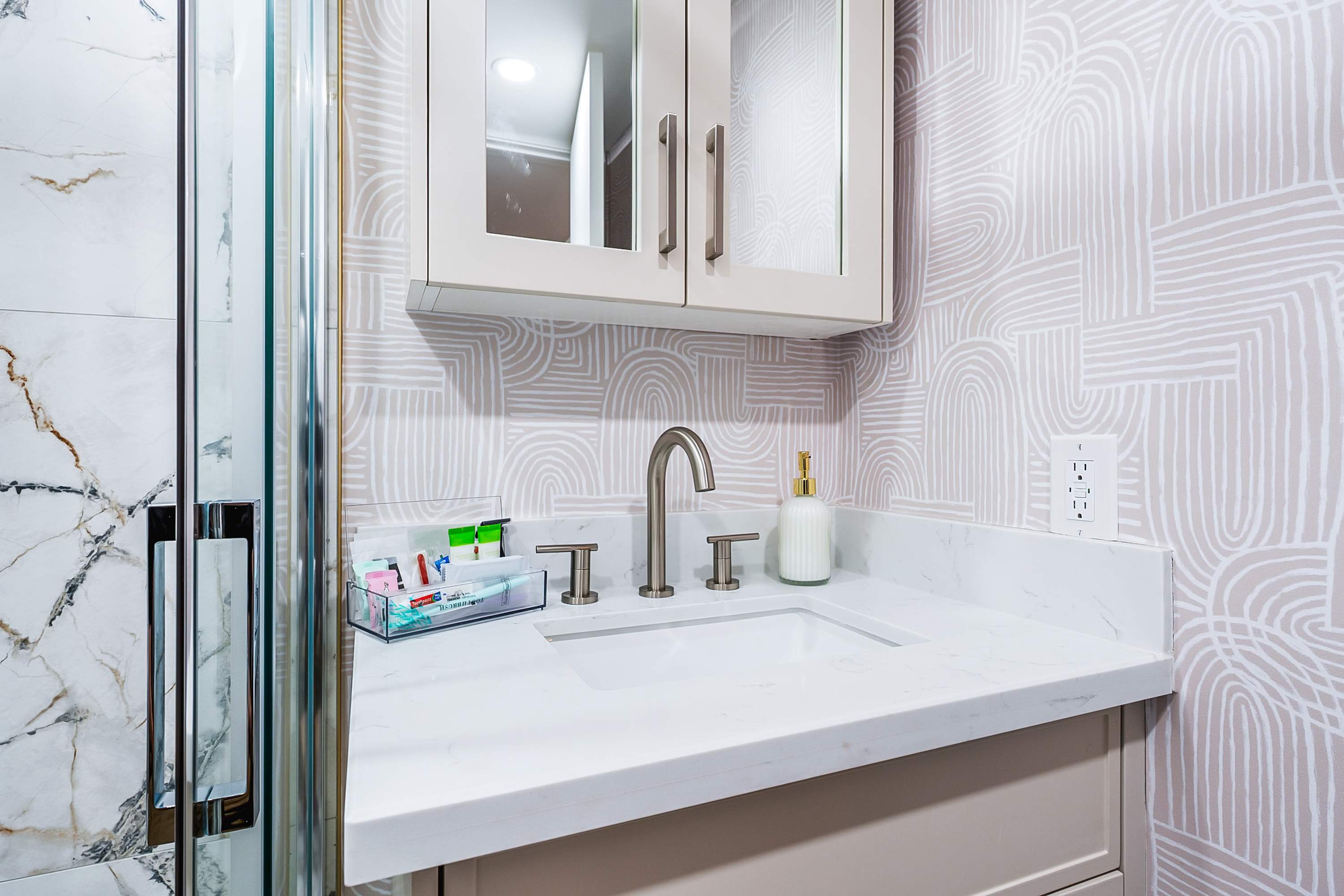 Modern bathroom with standing shower.