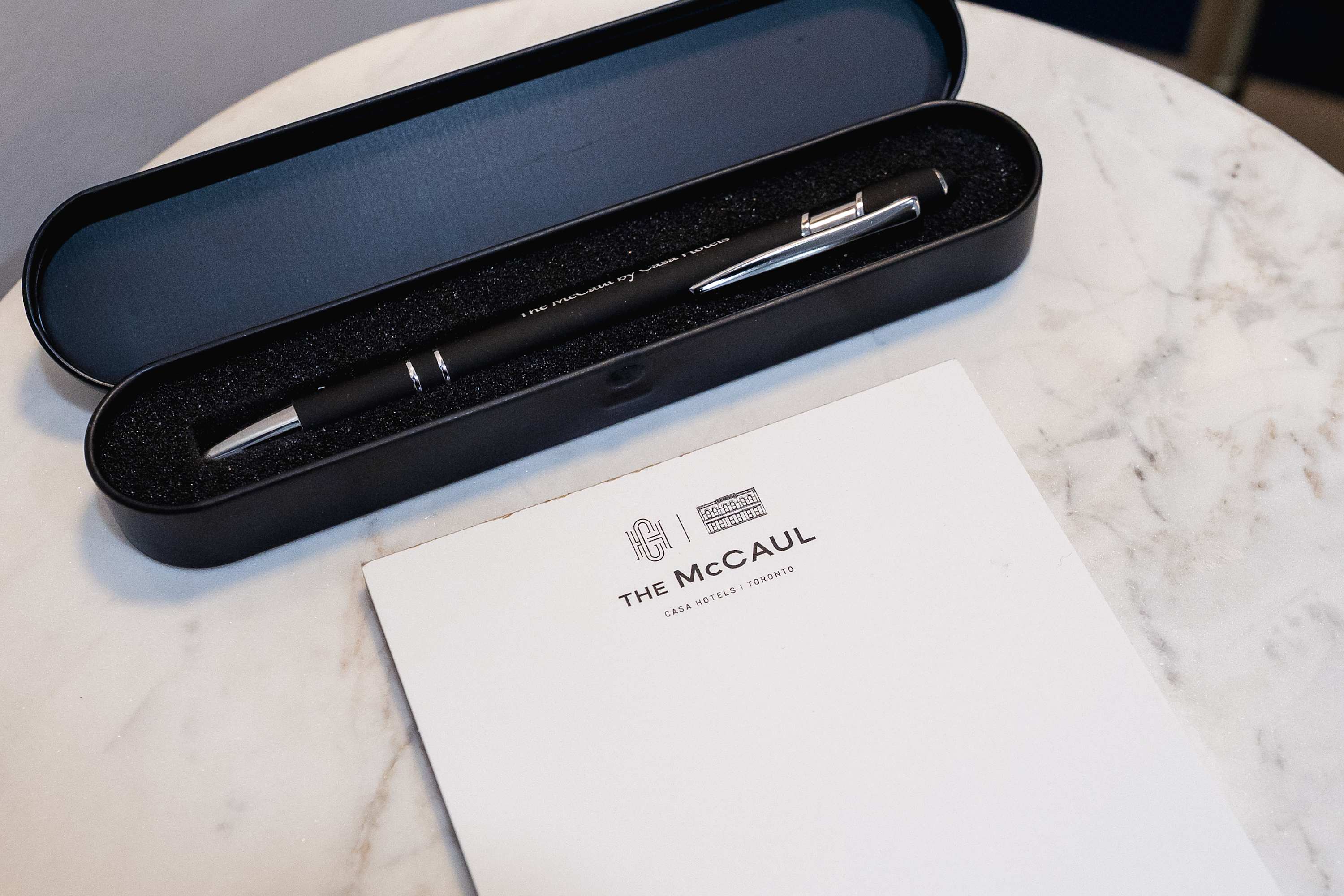 Stylish in-room stationery and thoughtful guest details.
