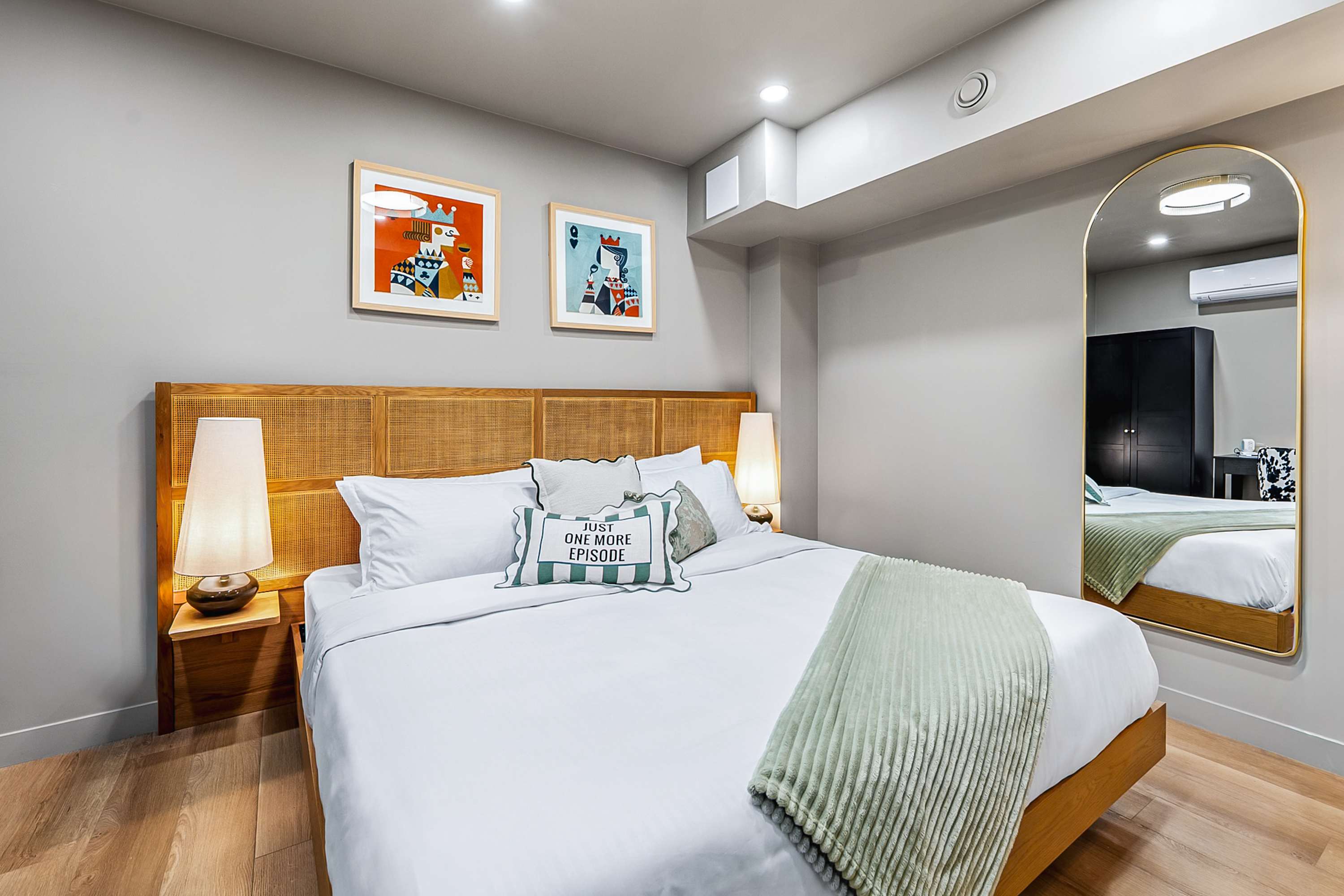 Serene bedroom with a luxurious king bed for restful nights.