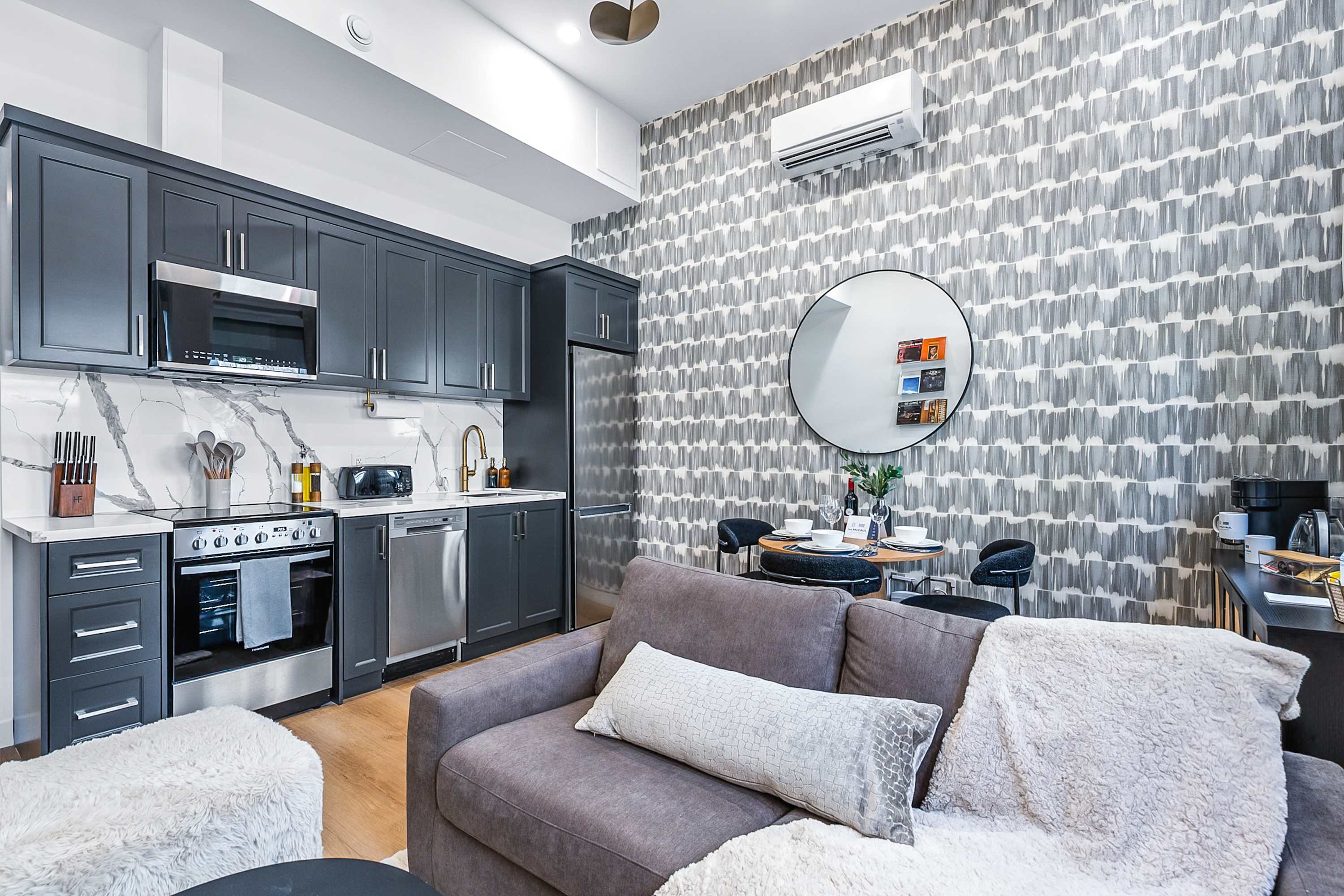 A cozy living area seamlessly connected to the kitchen and dining space.