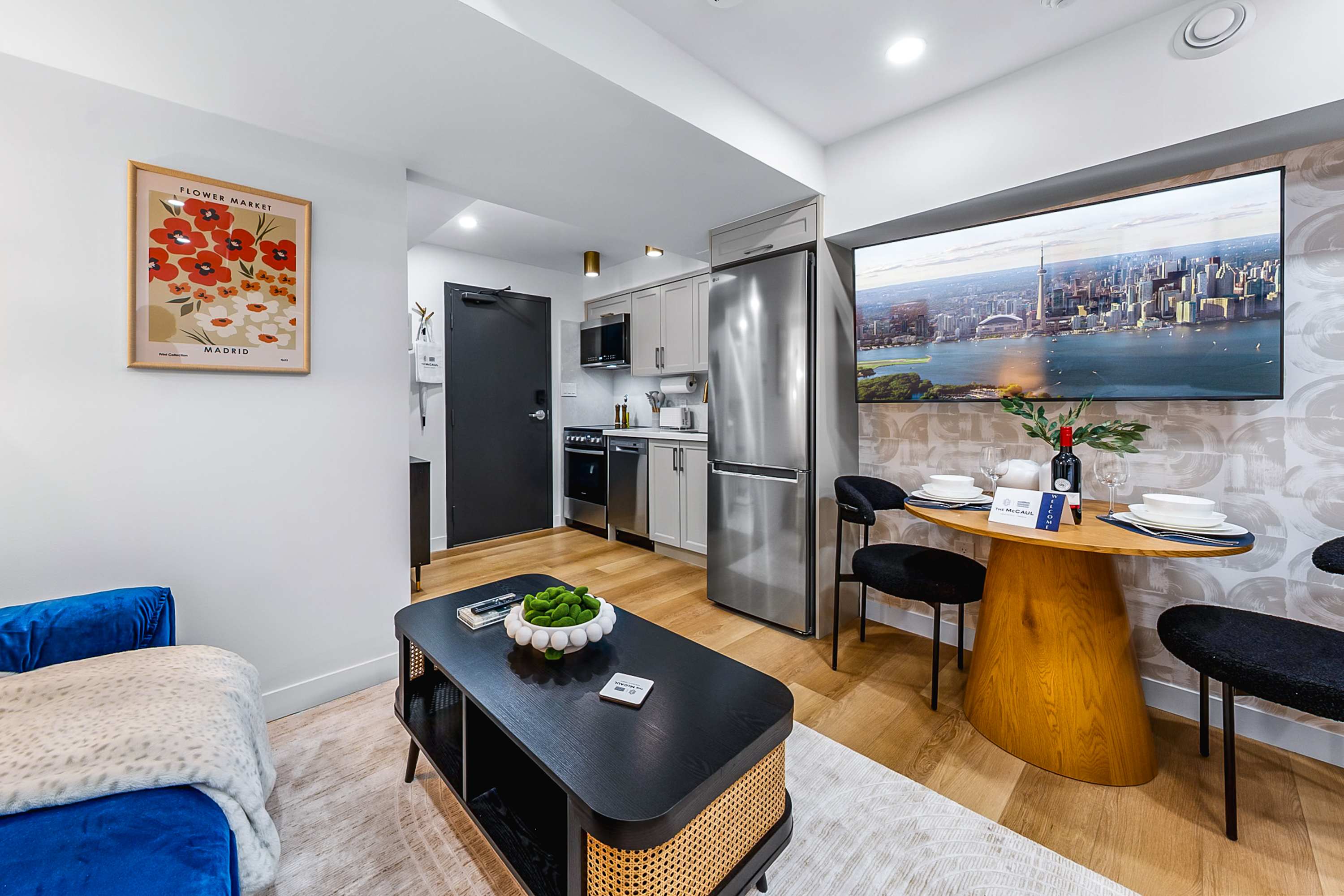 Open living space connecting the lounge, dining, and kitchen