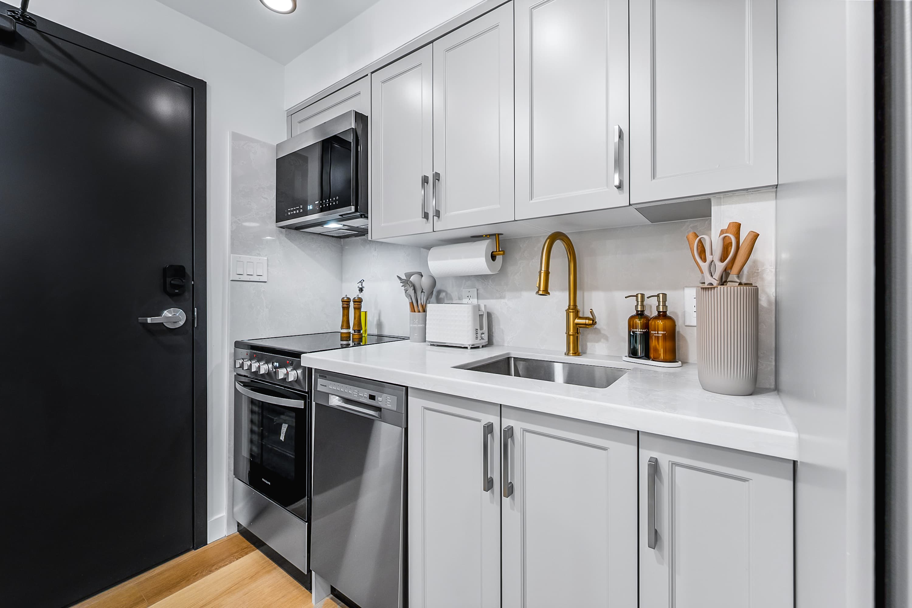 Well-designed kitchen with ample storage and counter space.