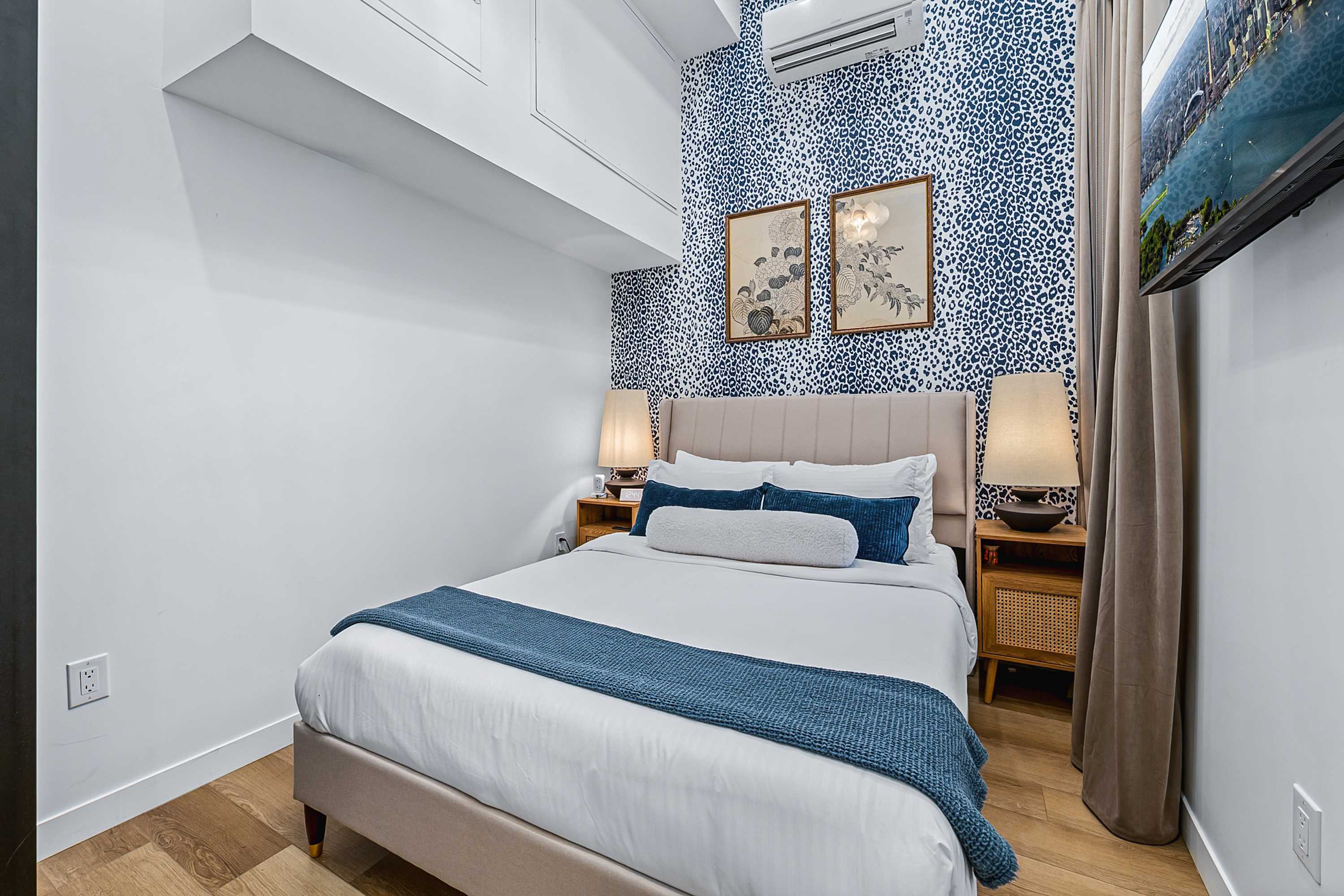 Wake up refreshed in this serene, beautifully finished bedroom with a queen bed and smart TV