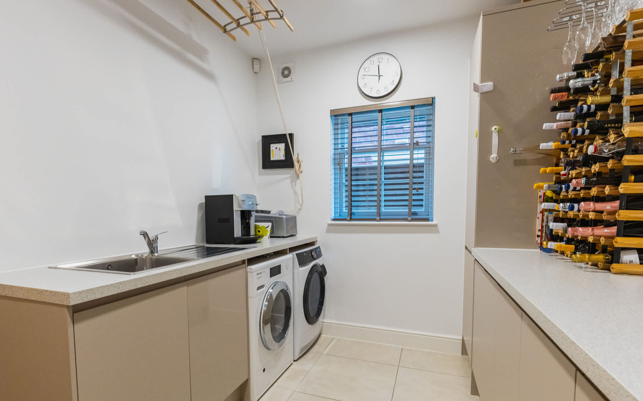 Dedicated utility room with washer, dryer and ample workspace—ideal for longer stays and family groups.