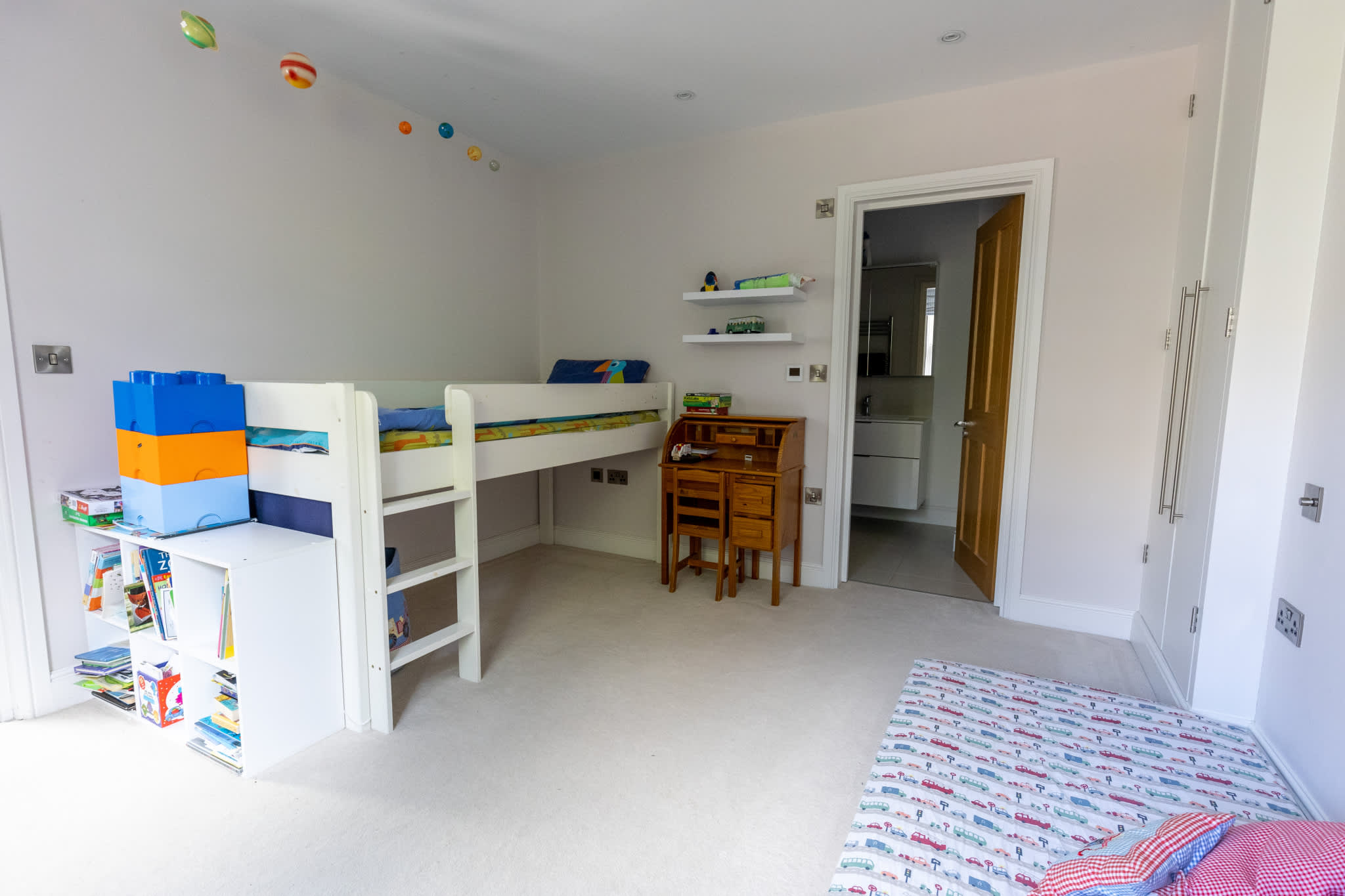 Spacious children’s bedroom with bunk bed, desk and plenty of room to play.