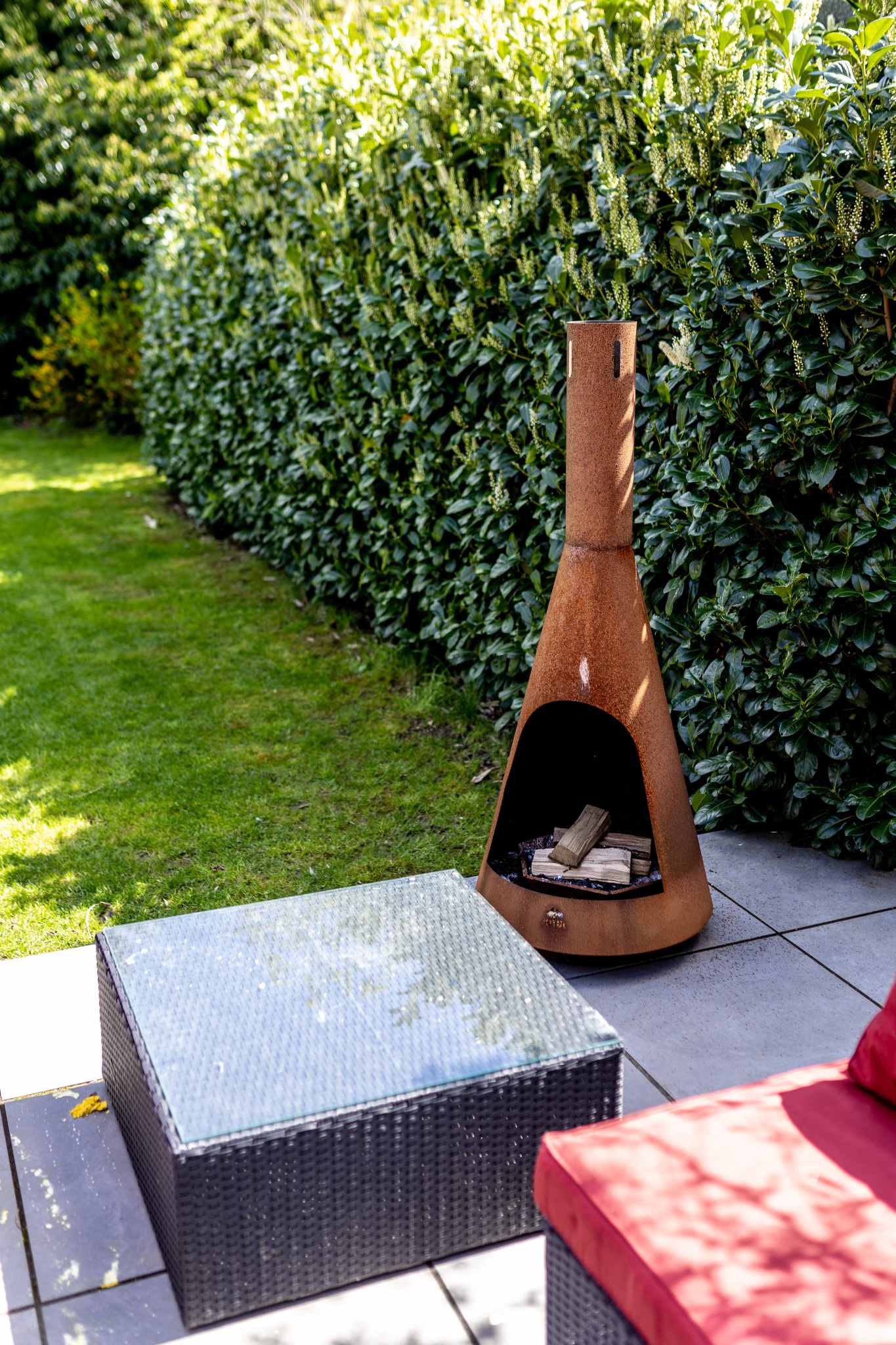 Private garden seating with outdoor fire pit, perfect for cosy evenings and relaxed gatherings.