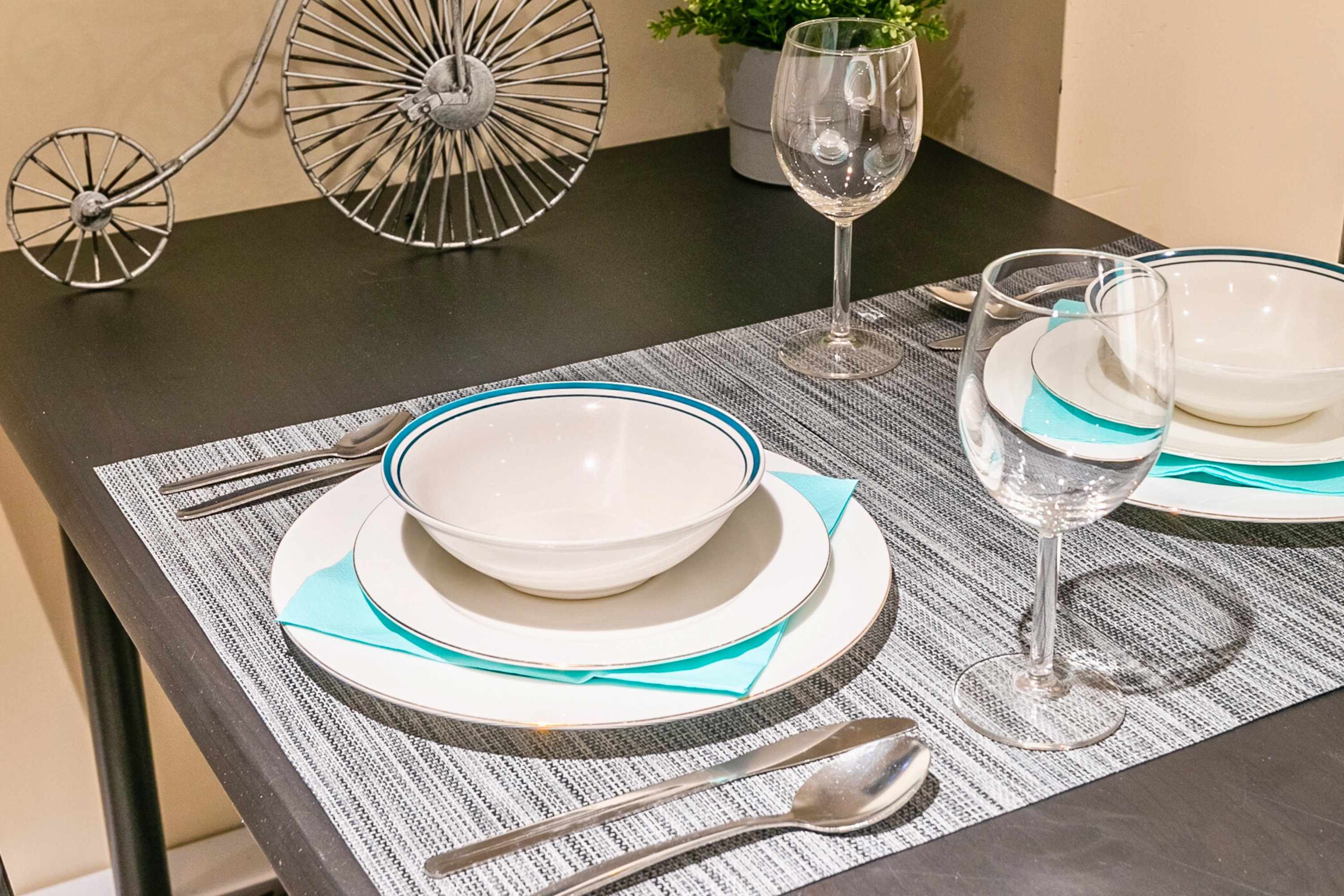 Intimate table for two set for a cozy dinner or relaxed evening wine.