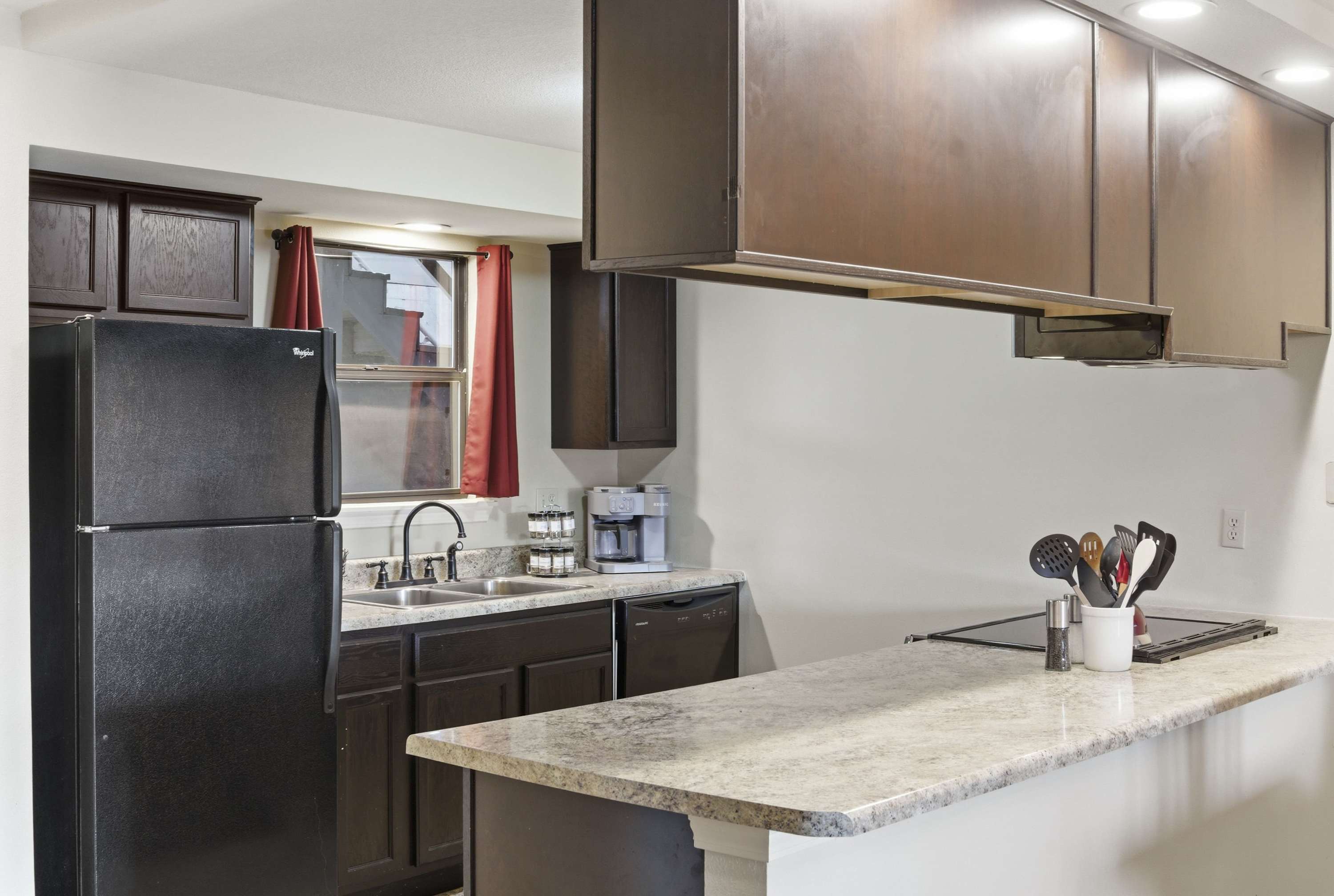 The cozy kitchen is well equipped for an unforgettable getaway​