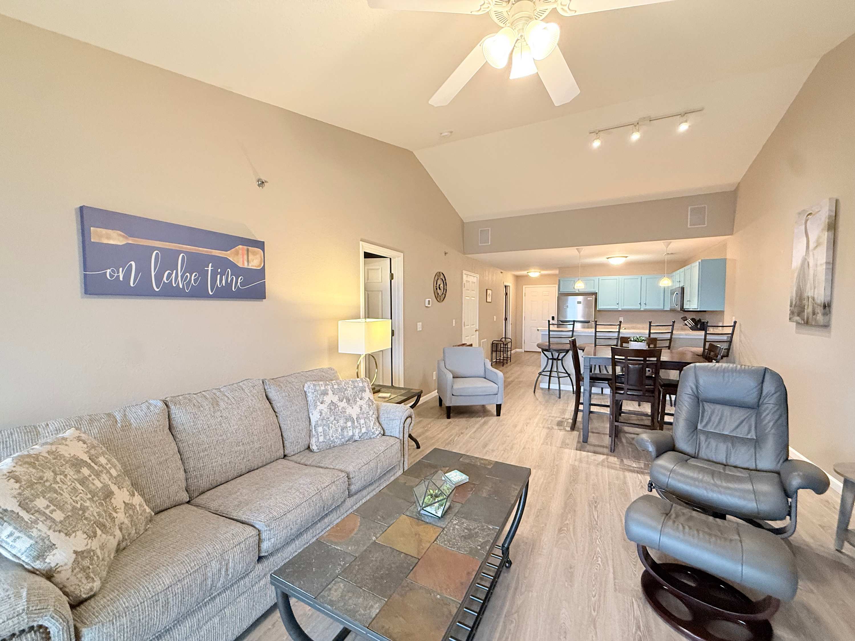 Step into the open living area, welcoming you with captivating lakeside vistas