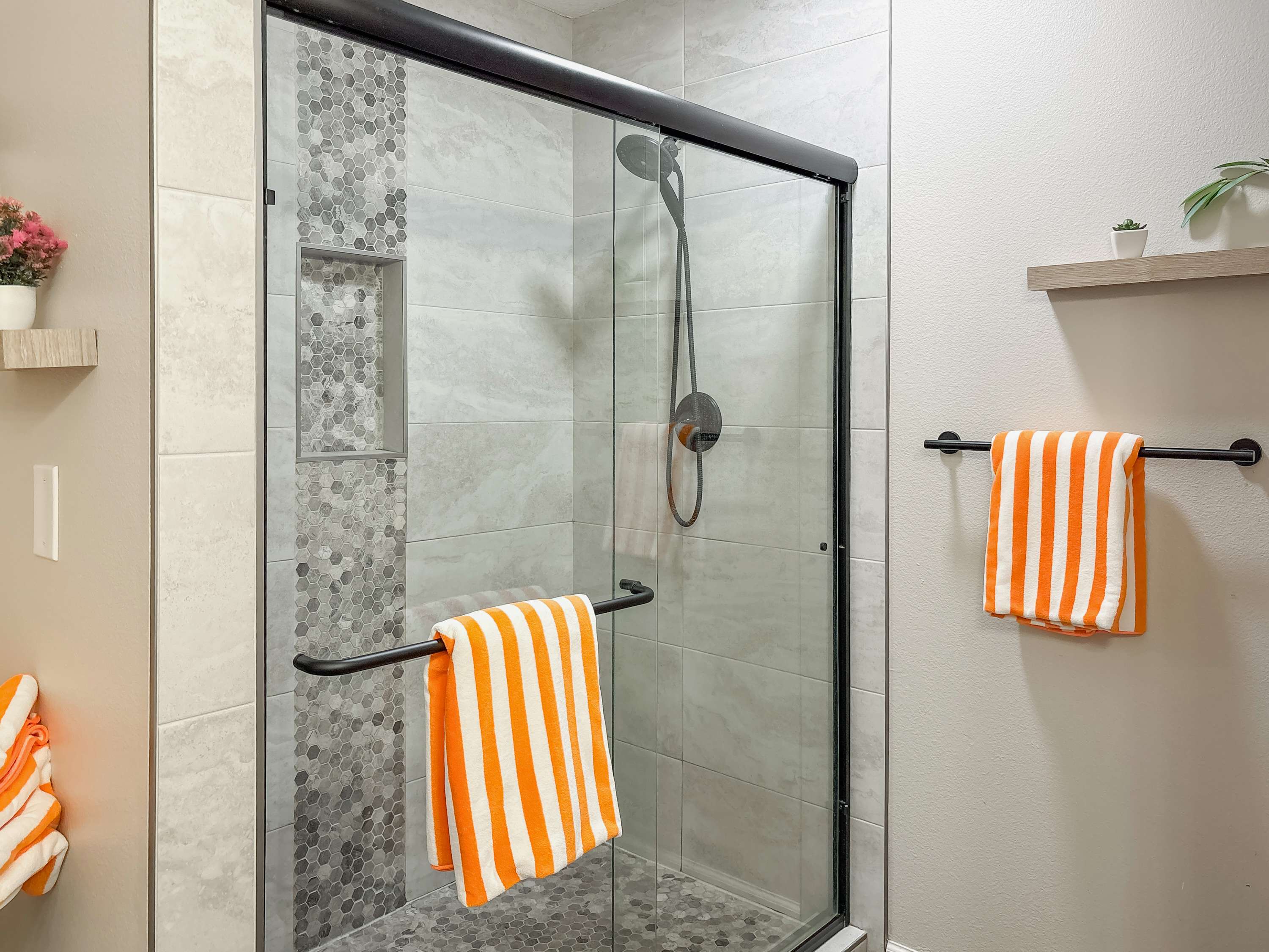 It has a beautiful walk in shower