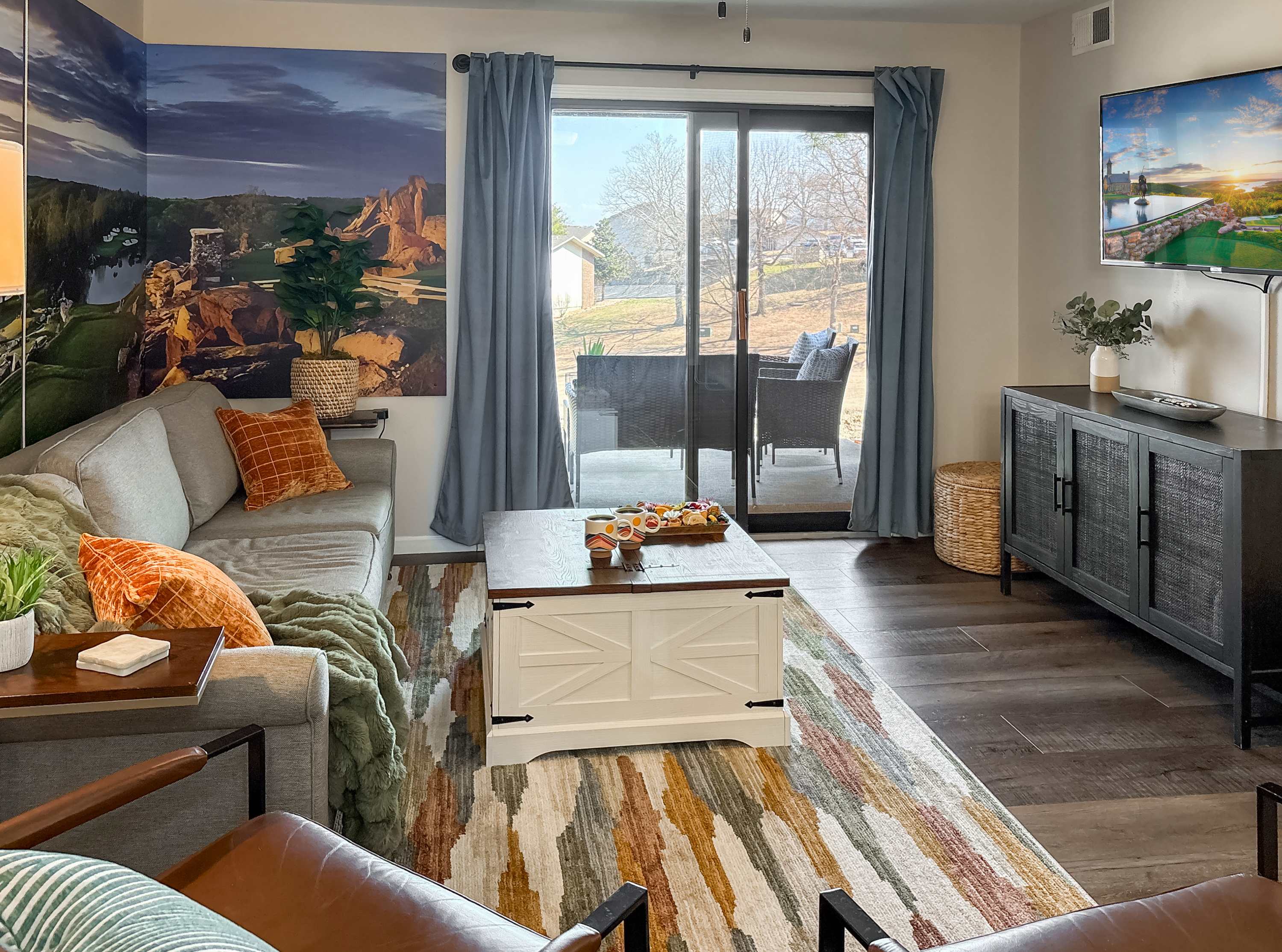 The living room opens out to the kitchen and the backyard patio.