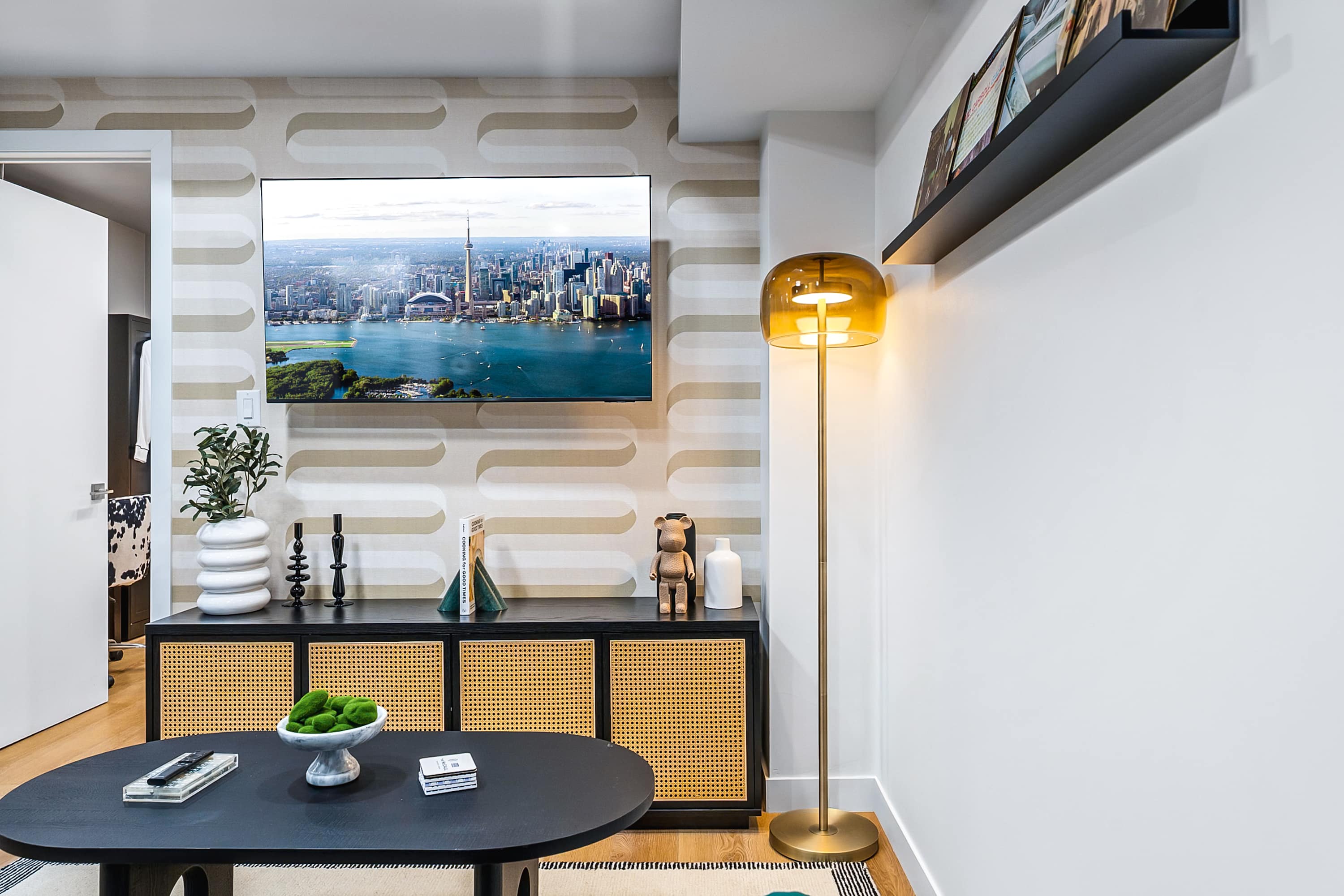 Bright & stylish living room with a comfortable sofa bed and smart TV.