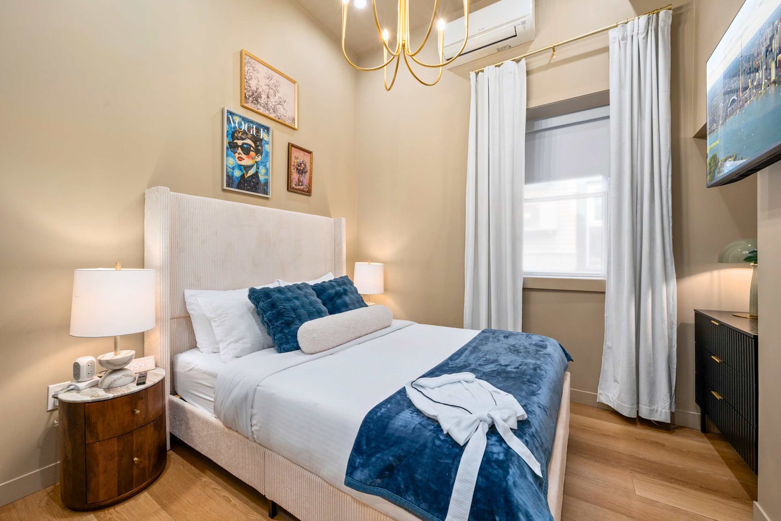 Serene bedroom with a comfortable queen bed and hotel-quality linens.