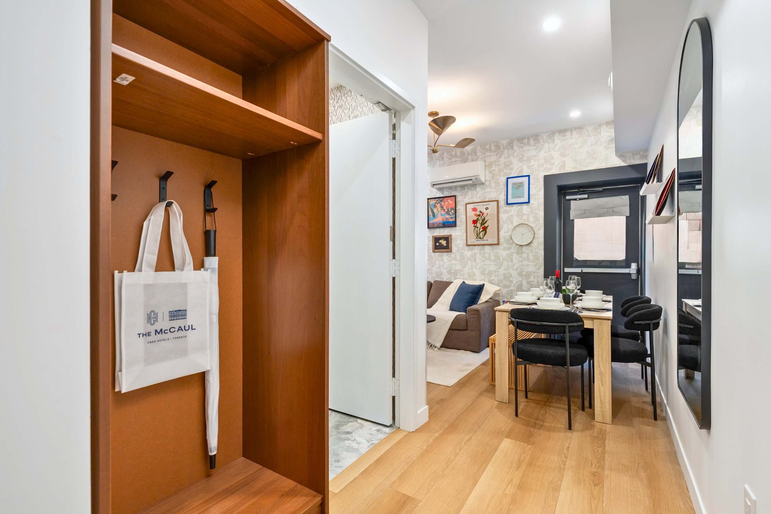 Dedicated entryway with coat storage and hooks.