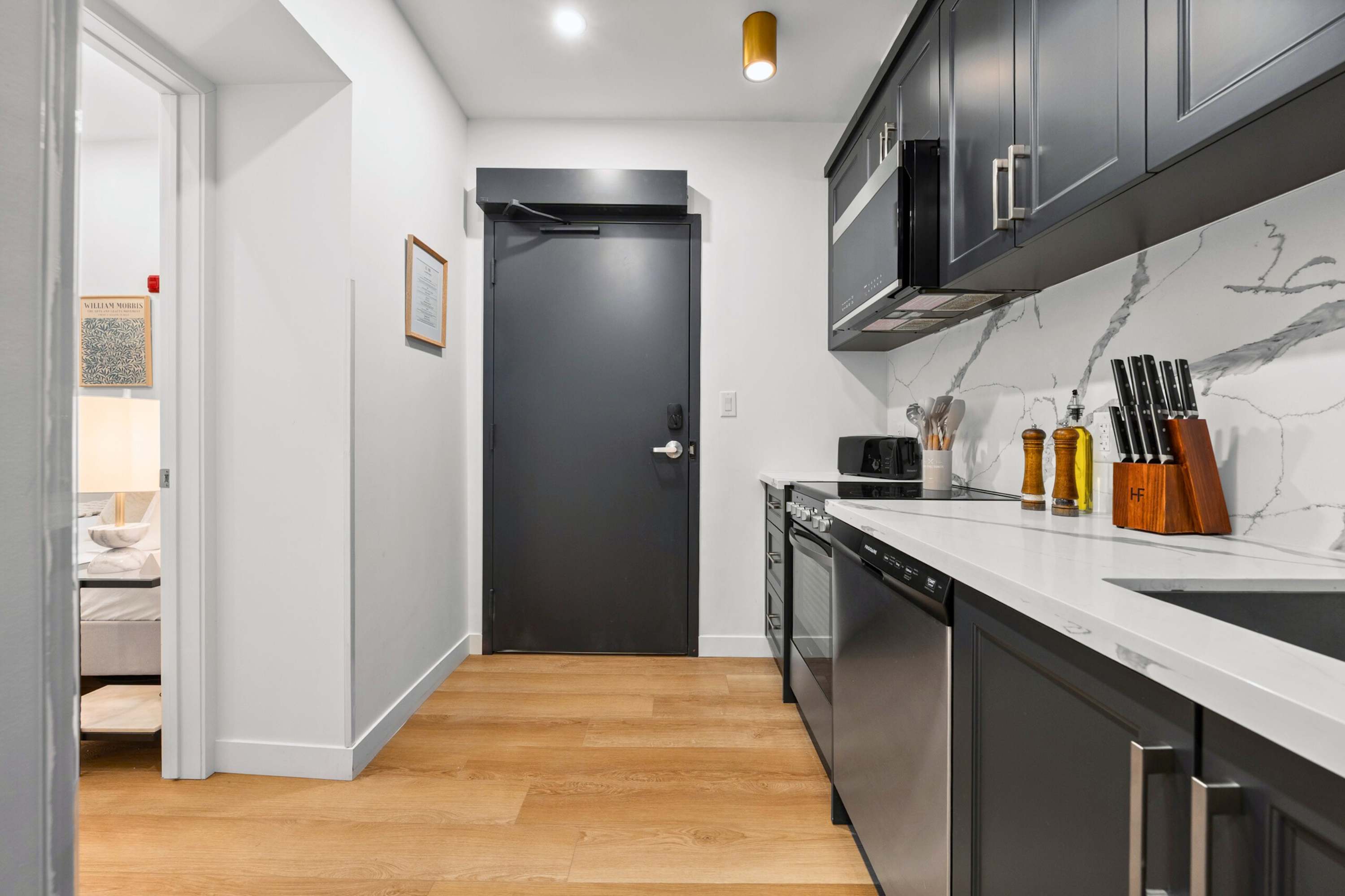 Welcoming kitchen space that naturally connects to the main bedroom.