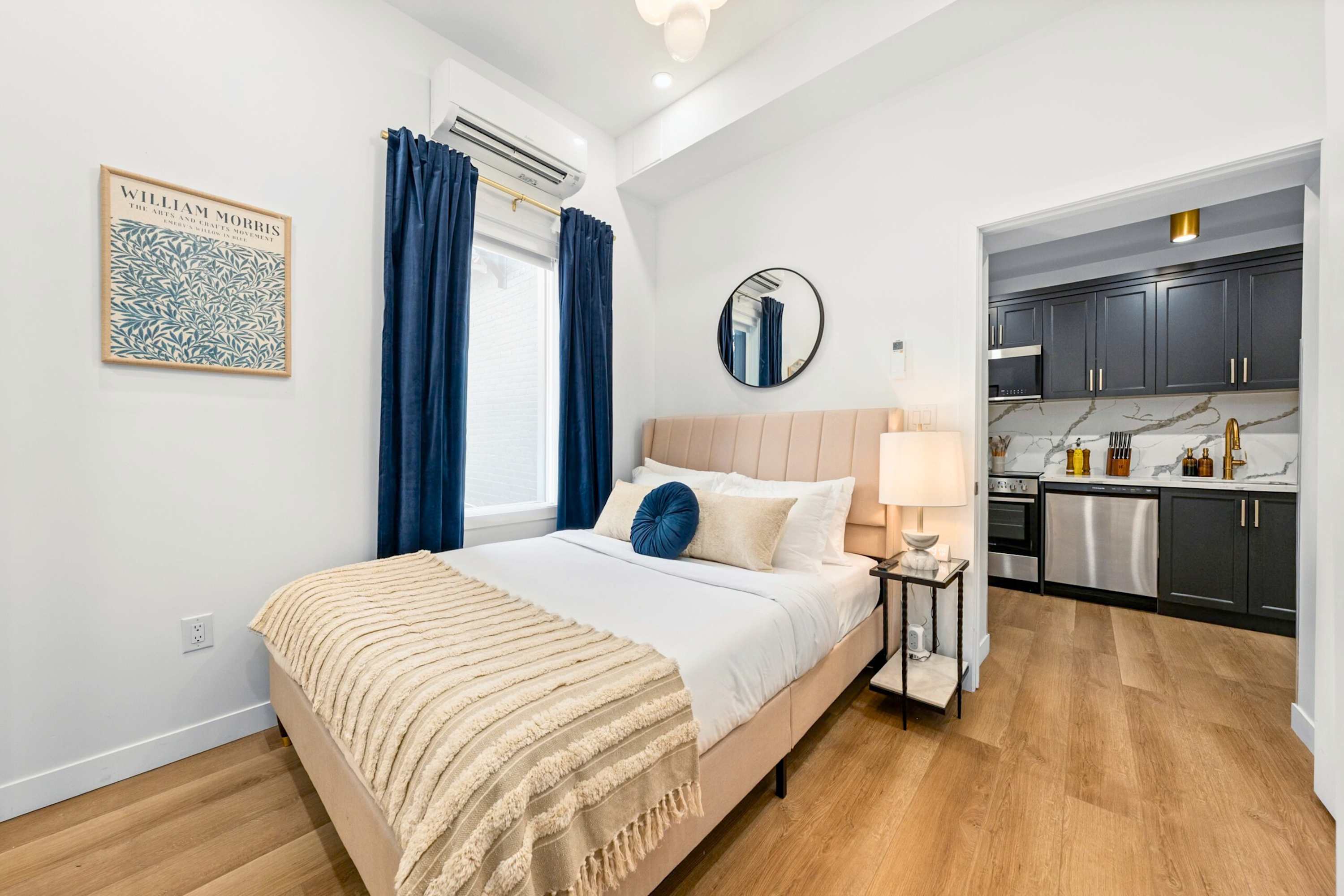 Efficient layout connecting kitchen and sleeping area.