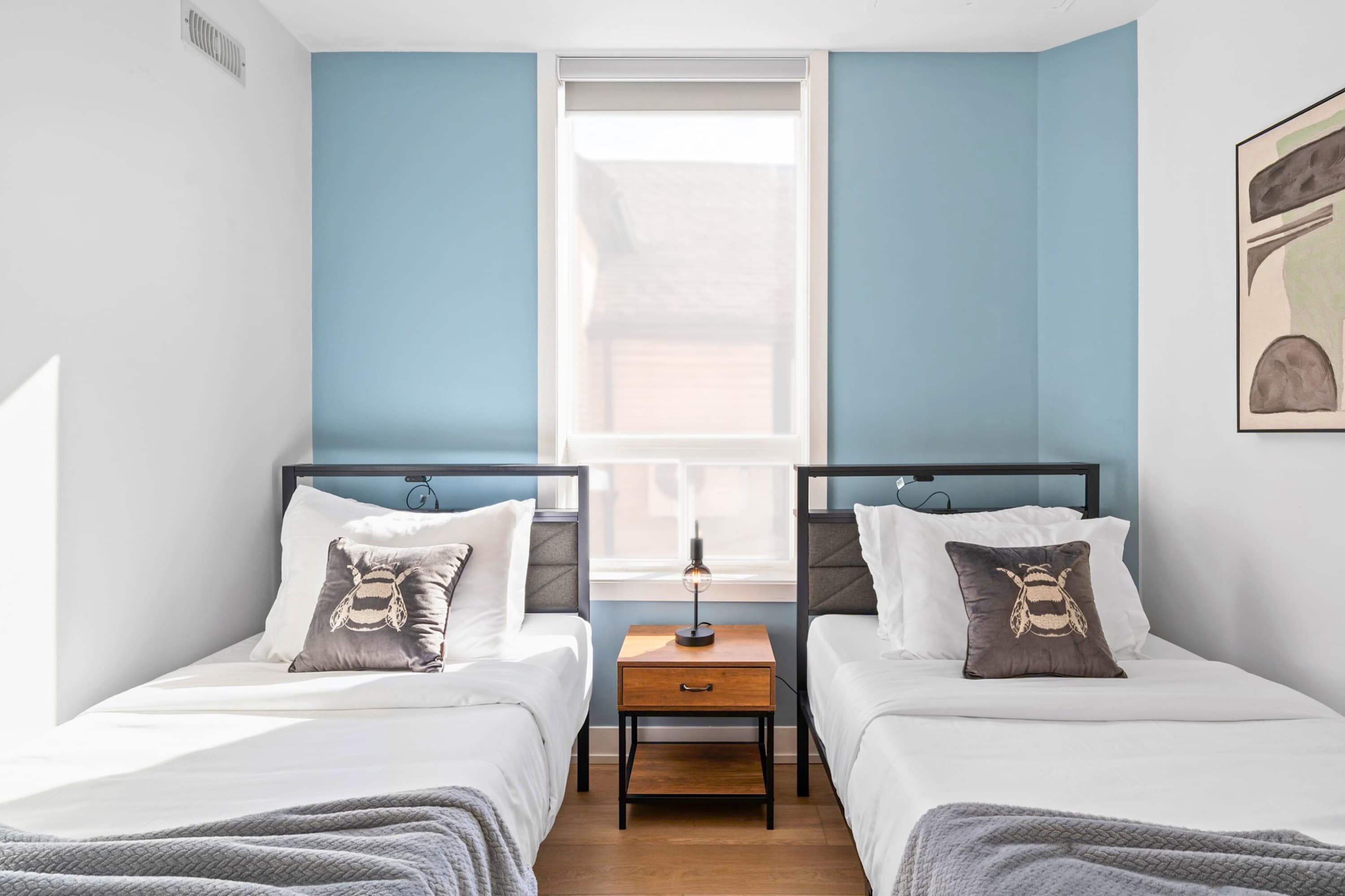 Twin bedroom with fresh linens.