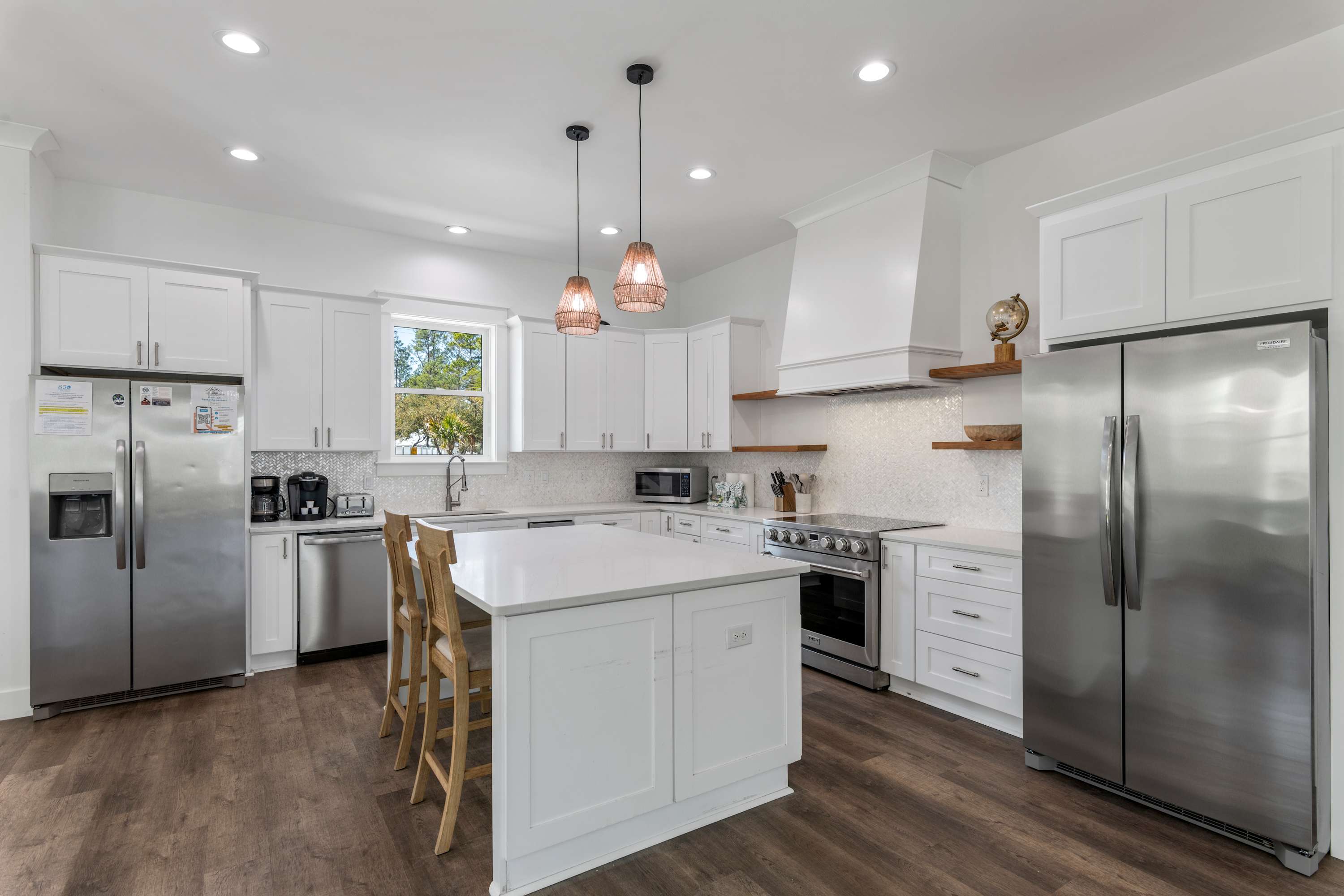 Custom kitchen with 2 full size refrigerators 