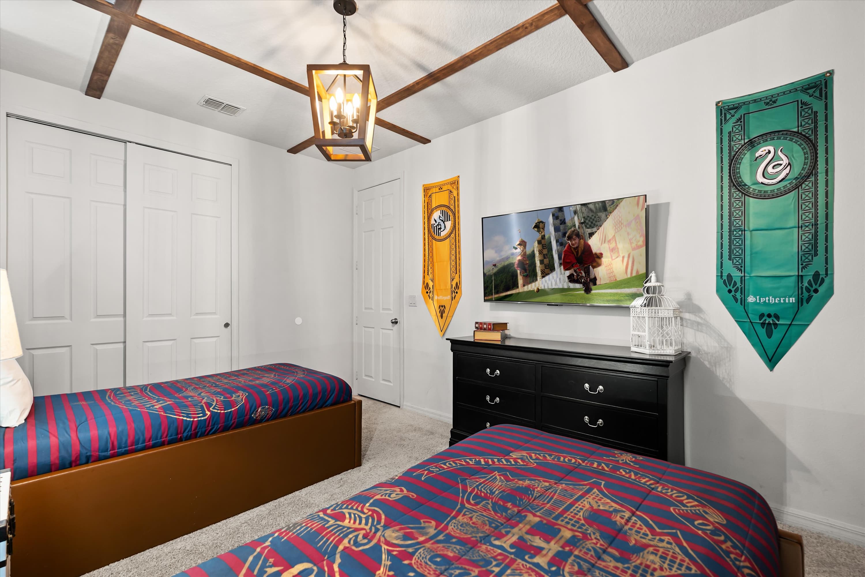 Enjoy shows and movies on the Smart TV in this magical Harry Potter room.