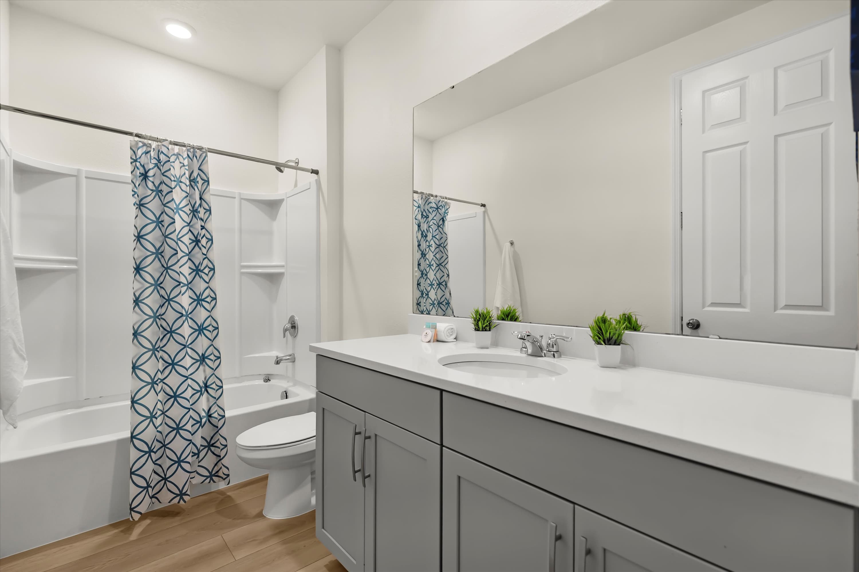 Bathroom featuring a sleek bathtub for comfort and relaxing moments.