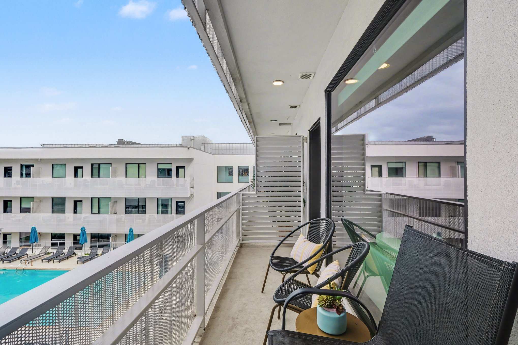 Lounge the day away in the fresh air on the breezy balcony